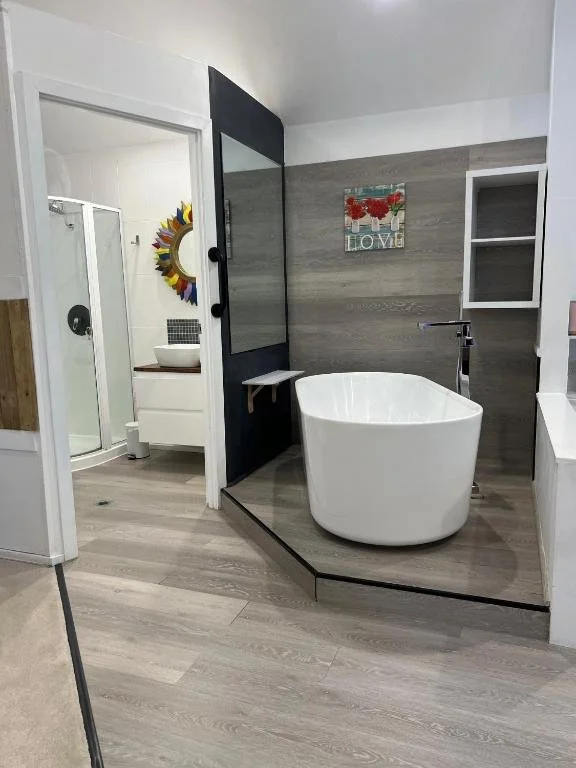 Select chalets feature spacious bathrooms designed for unwinding after a day exploring Tamborine Mountain’s rainforest walks and local sights.