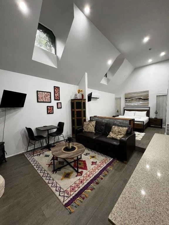 Spacious open-plan chalet accommodation on Tamborine Mountain, designed for comfort, convenience and easy rainforest living.