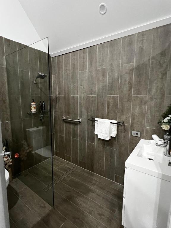 Clean, modern bathrooms add to the comfort of this Tamborine Mountain rainforest accommodation, ideal for weekend escapes and longer stays.