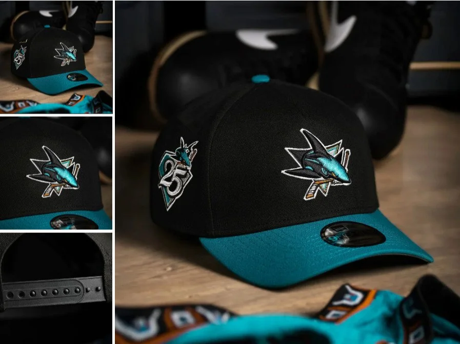 San Jose Sharks baseball cap with team logo on front, teal brim, and adjustable strap at back, placed on a wooden surface.