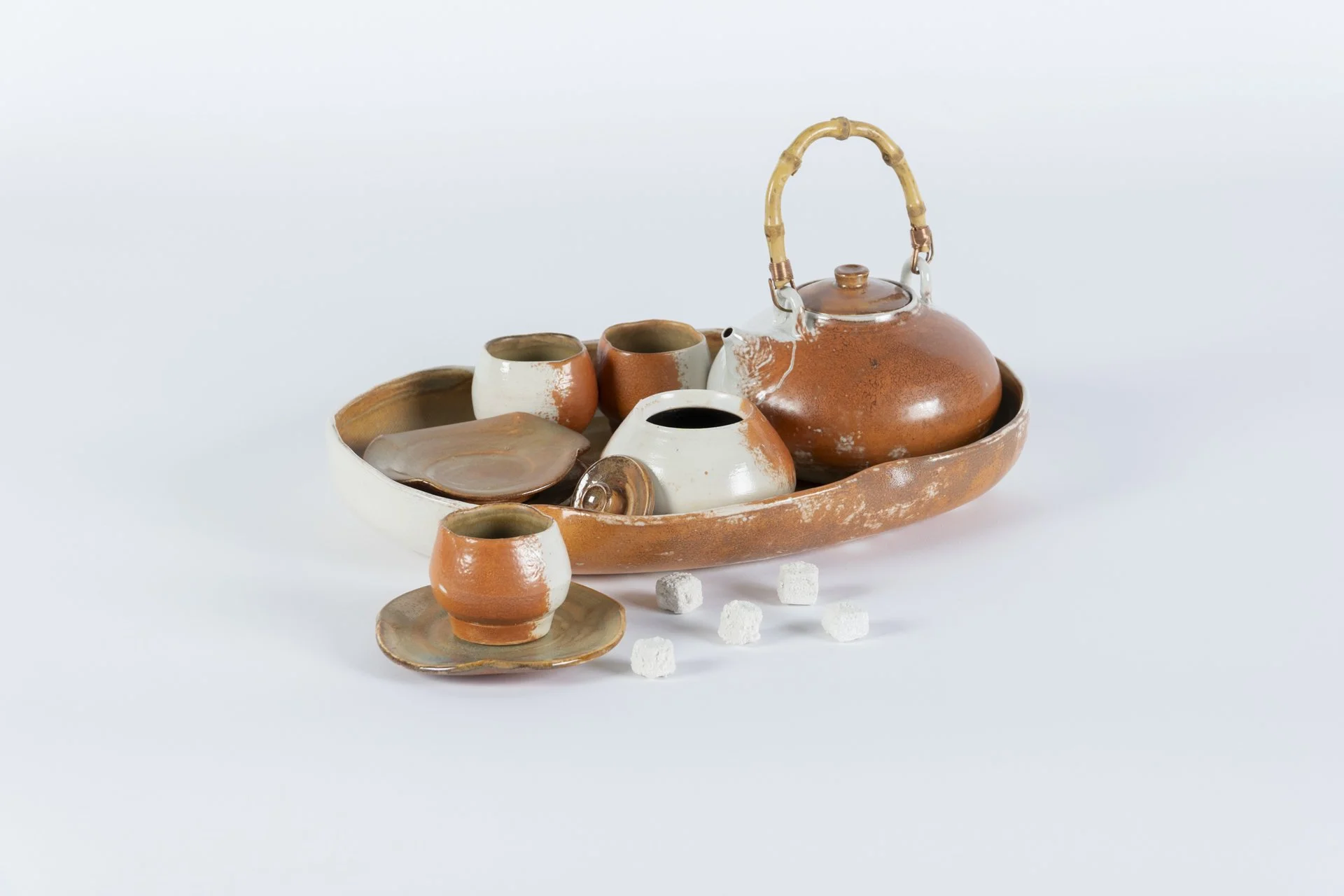Patience Tea Set, 2025, Porcelain, Toffy Glaze with Flashing Slip, Salt-Fired, 7 ½ x 13 x 9 ½ in