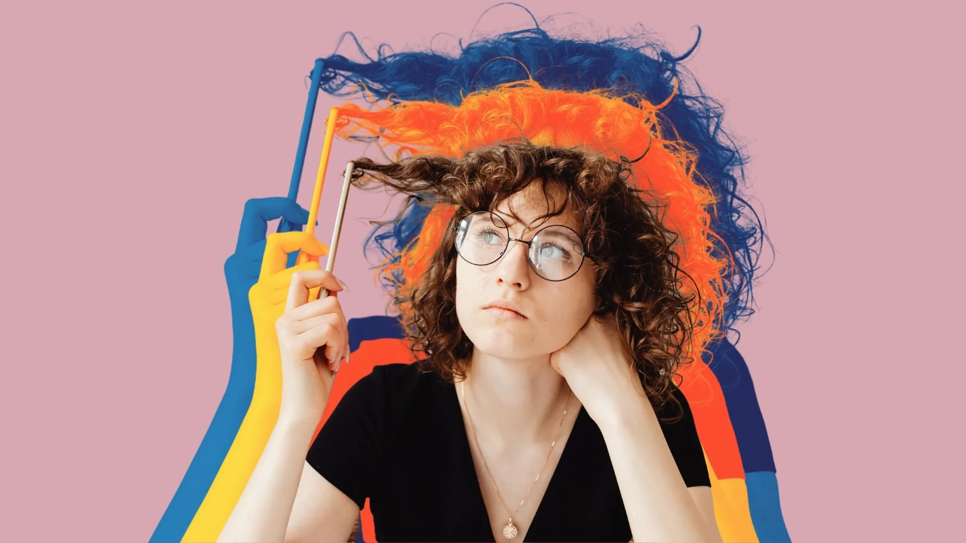 A woman with curly brown hair and glasses sitting with her chin resting on her hand, looking thoughtfully while holding a pen to her head. Behind her, colorful silhouettes of her head in blue, orange, and red fade into a pink background.