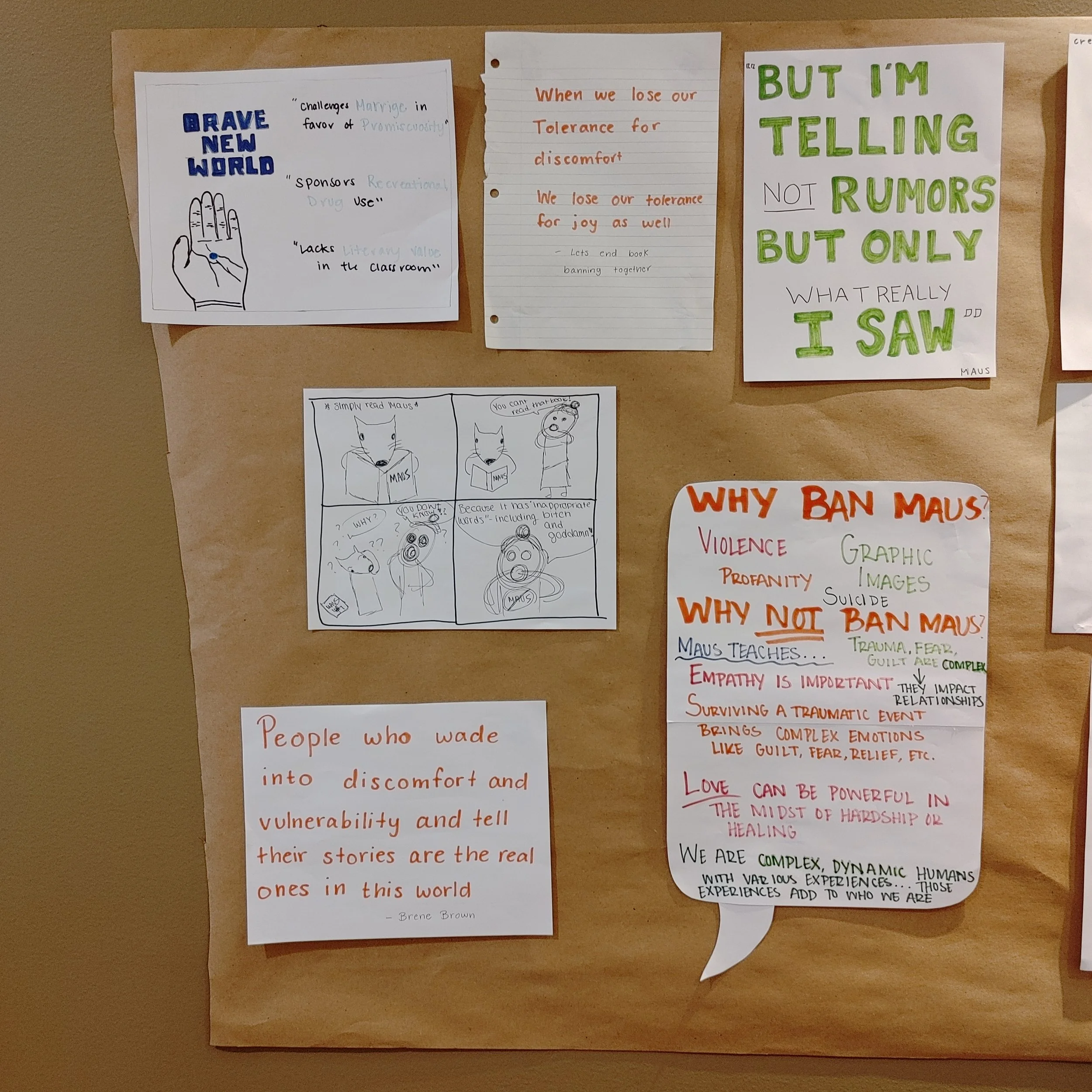 An information board at a college with dialogue about book banning