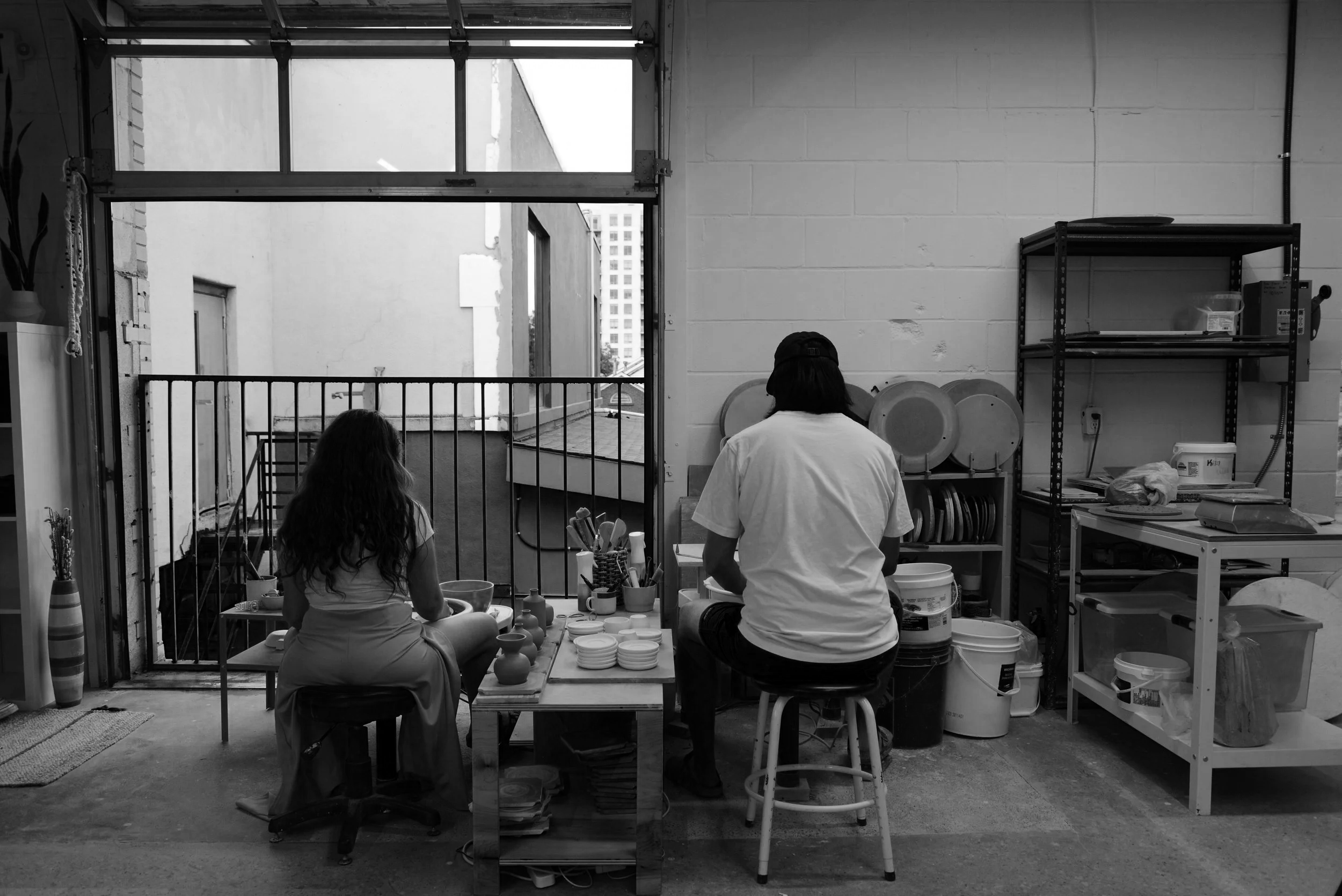 Pot Pot Studio co-owners Jon and Rose wheel throwing at the pottery studio in Toronto, ON.