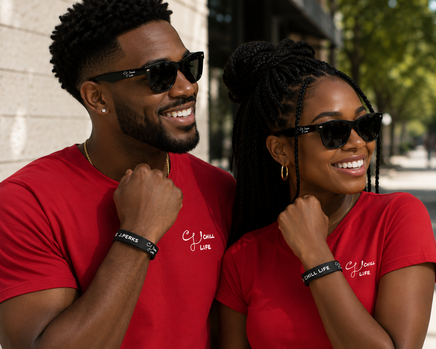 African american male and female  wrist band and shades.png