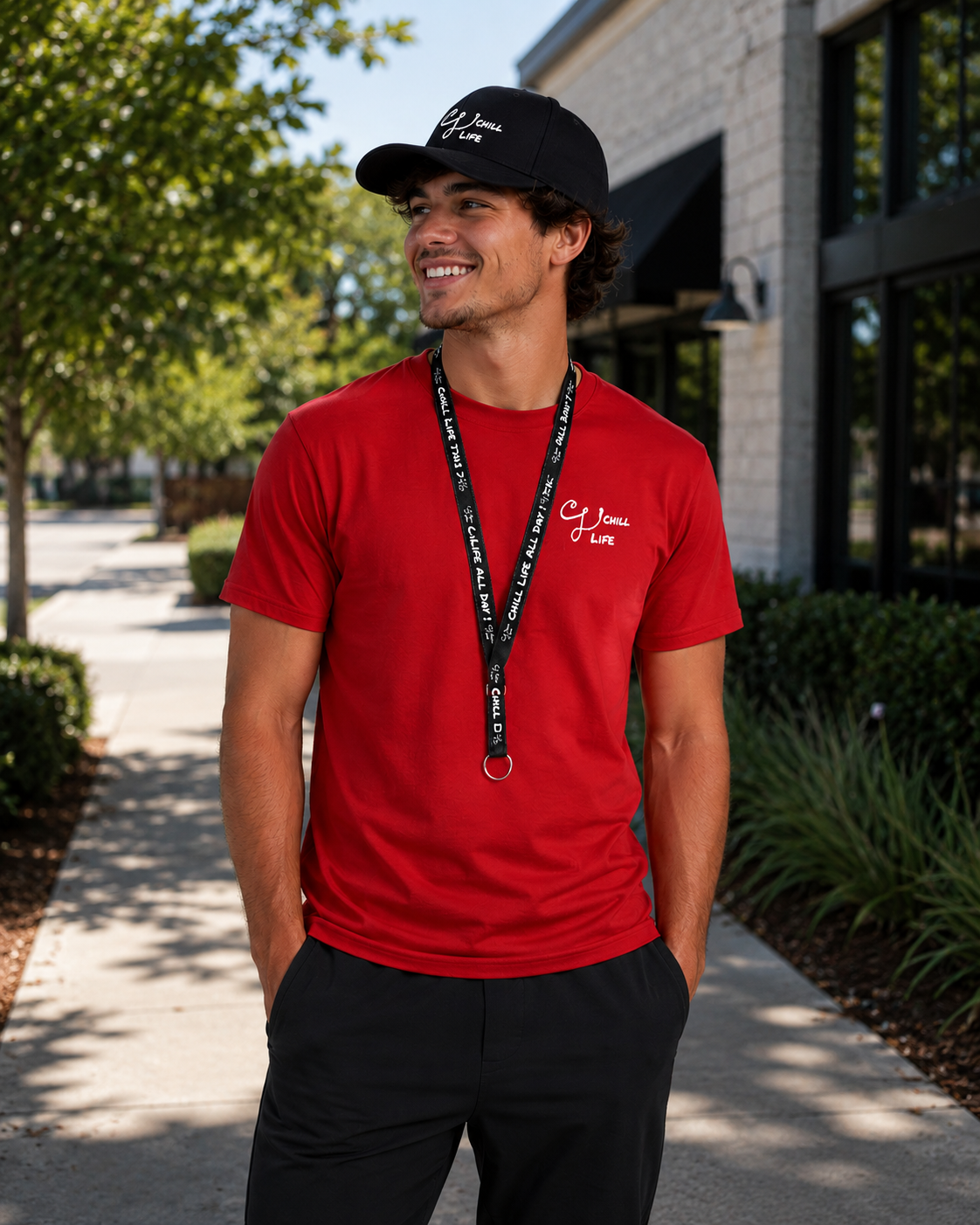 Male model shirt lanyard and hat.png