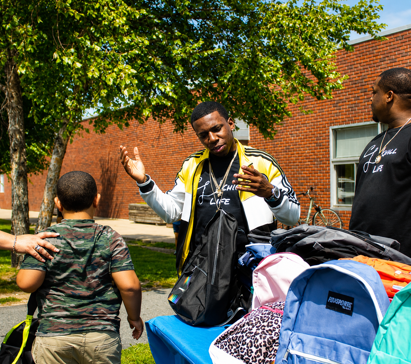 Jamal back of kid looking dowm.png