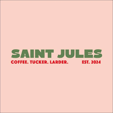 Logo for Saint Jules with green and red text on a pink background.
