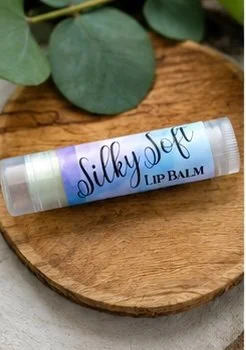 Lip balm on a wooden plate.jpg