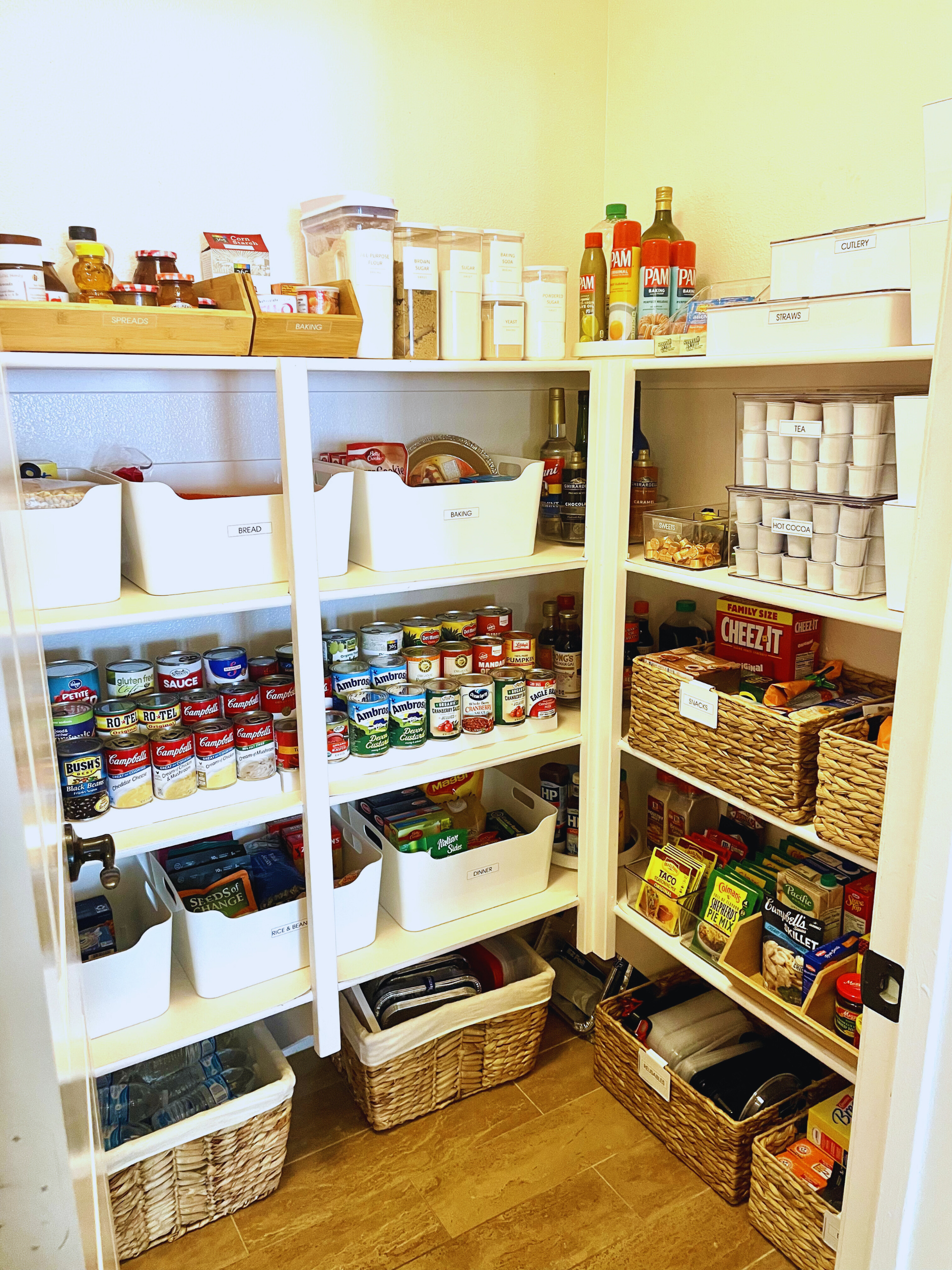 Professionally organized kitchen pantry with labeled bins and neatly arranged shelves in Encinitas home.