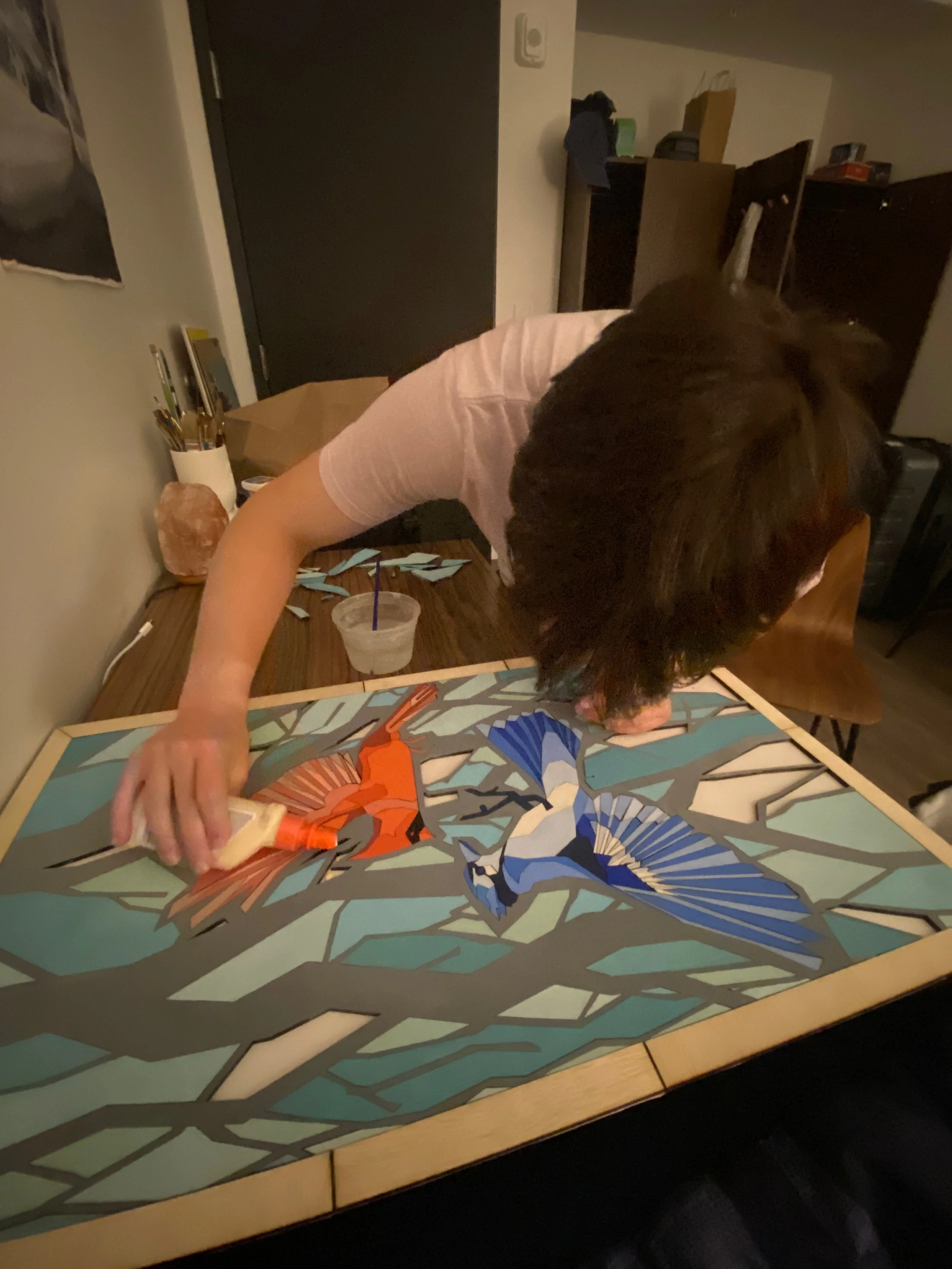 Winter in the Trees- my final illustration project for sophomore year. Designed in Adobe illustrator, Cut with a laser cutter, painted with acrylic paint, then glued into place like a puzzle with wood glue.