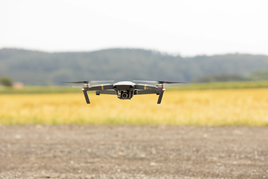 Drone hovering over a farm field