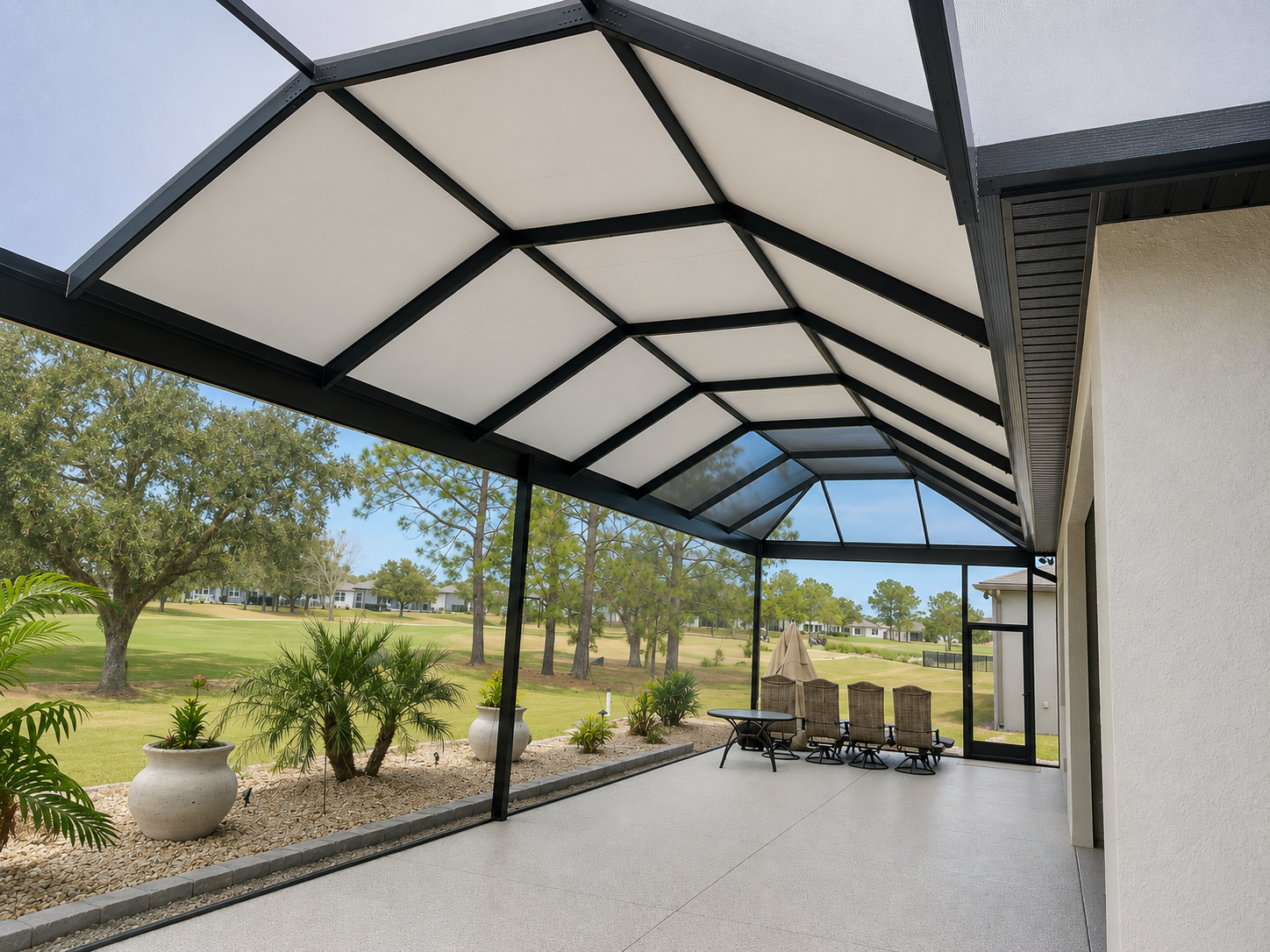 Modern screened patio with scenic view.png