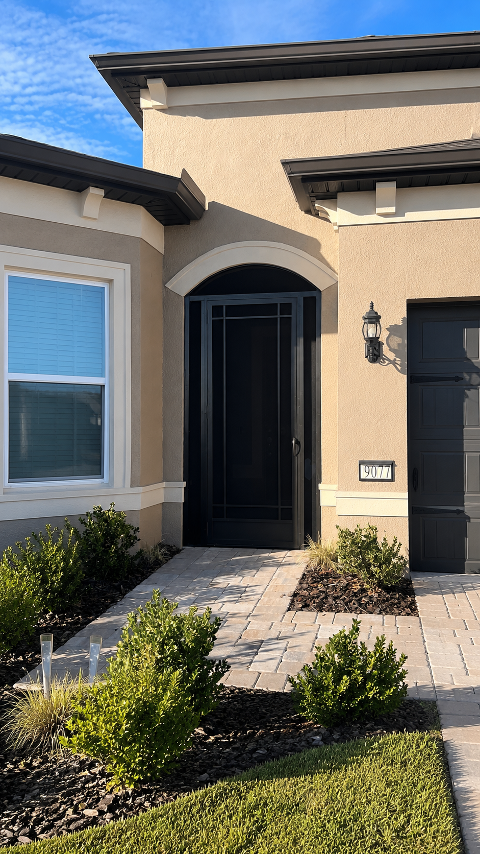 Sunny suburban house entryway.png