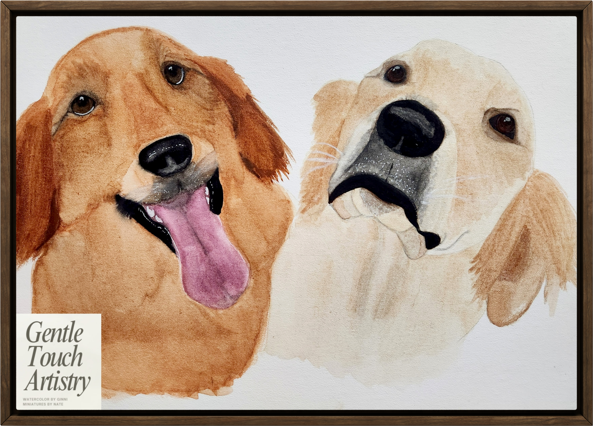 Watercolor painting of two dogs, one golden retriever with mouth open and tongue out, another retriever with head tilted, framed in a wooden border.