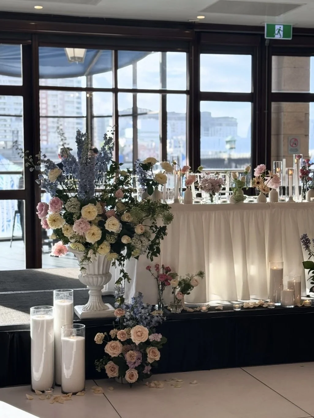 Pastel floral wedding styling designed to complement architectural features at a Sydney waterfront reception