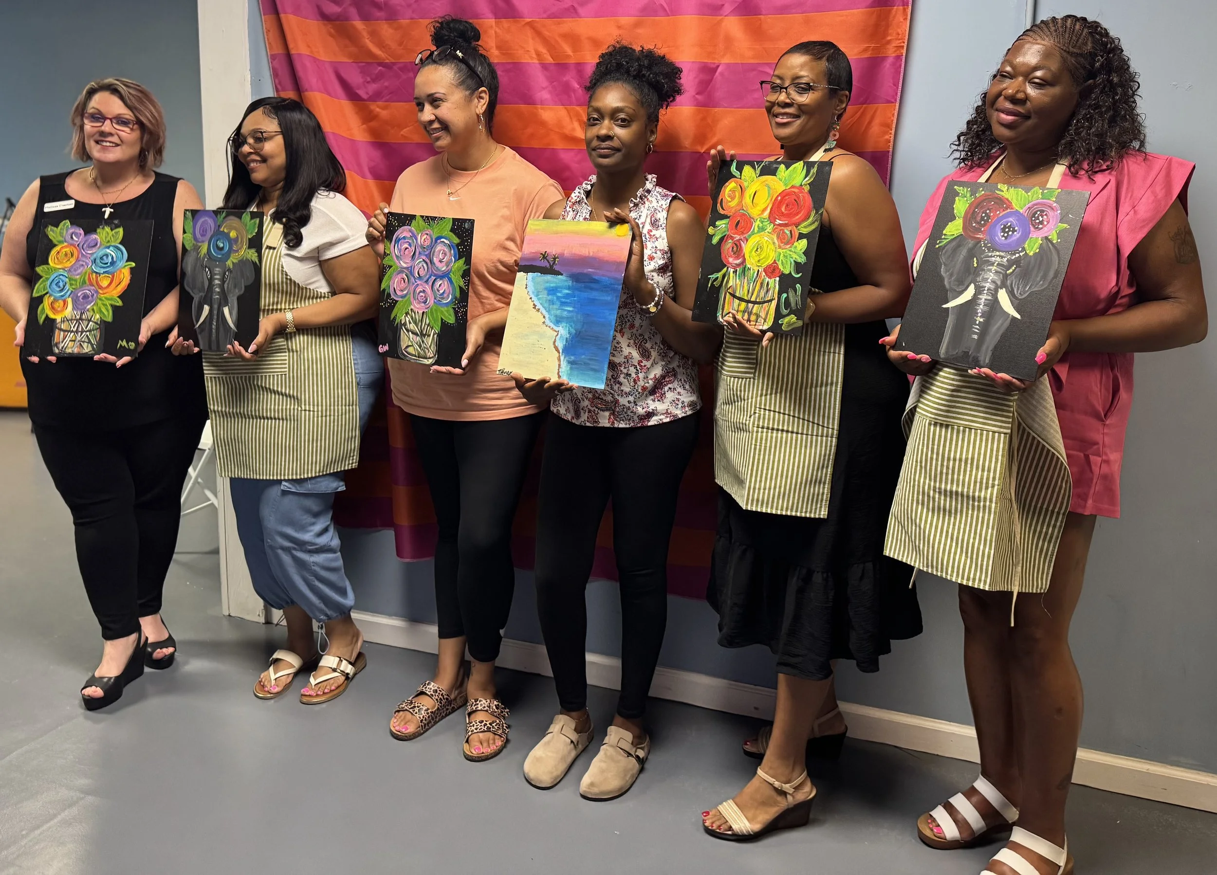 Group photo of students turned artist - Paint n pop  