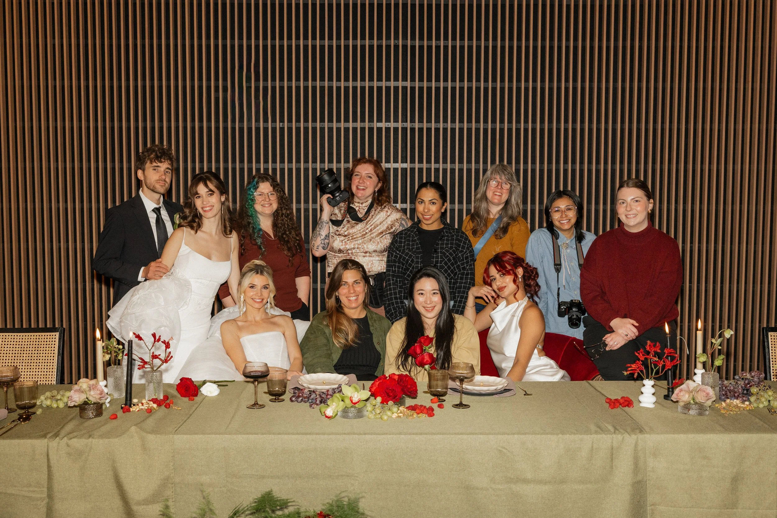 Wedding vendors and creatives celebrating a completed editorial styled shoot featuring floral installations and event design.