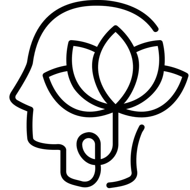 Outline of a human head with a lotus flower symbol in place of the brain, suggesting mindfulness or mental wellness.