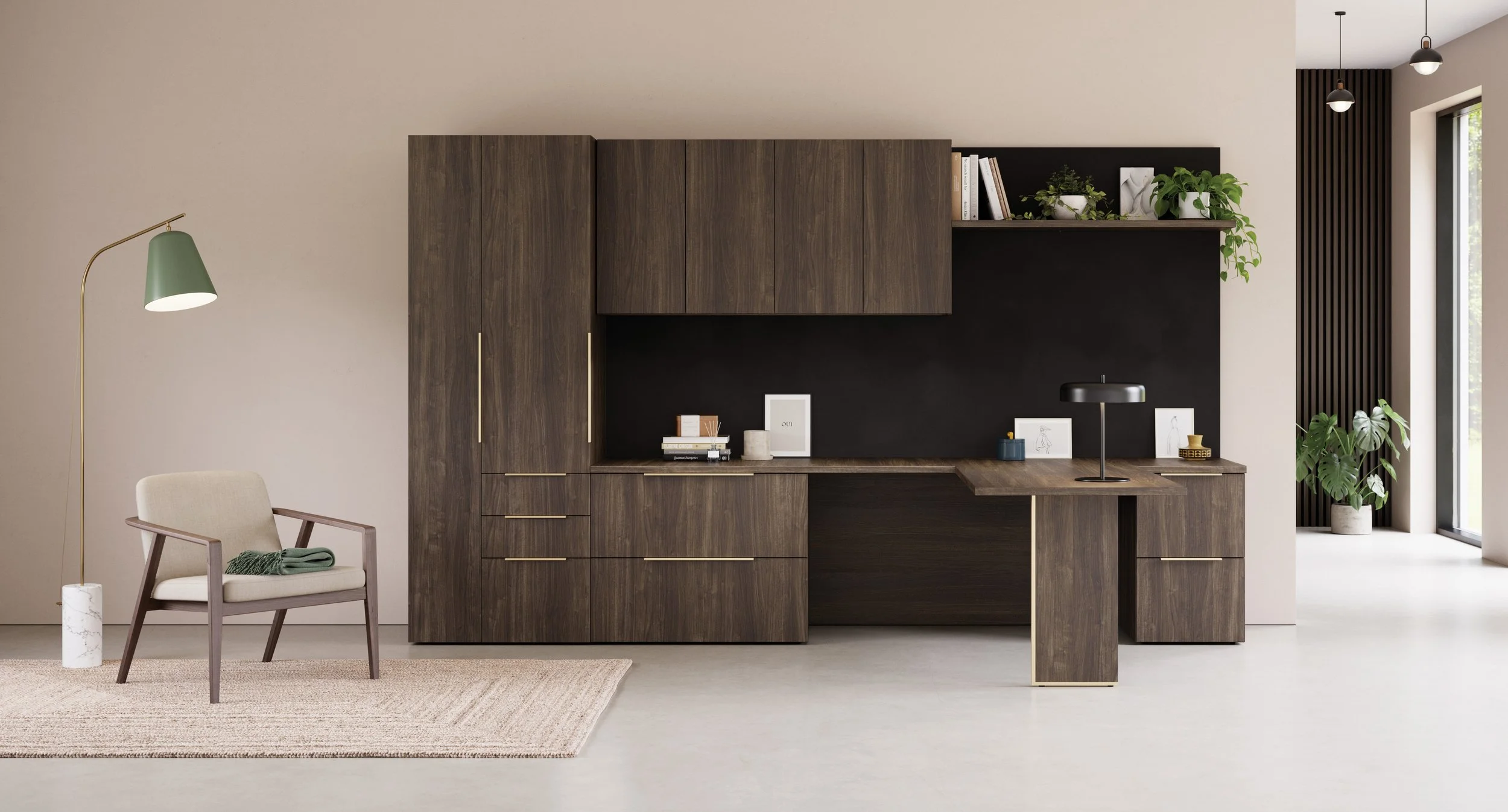 Modern living space with a dark wooden built-in desk and wall cabinet, a beige armchair with a green throw, a beige rug, and various potted plants near large windows.