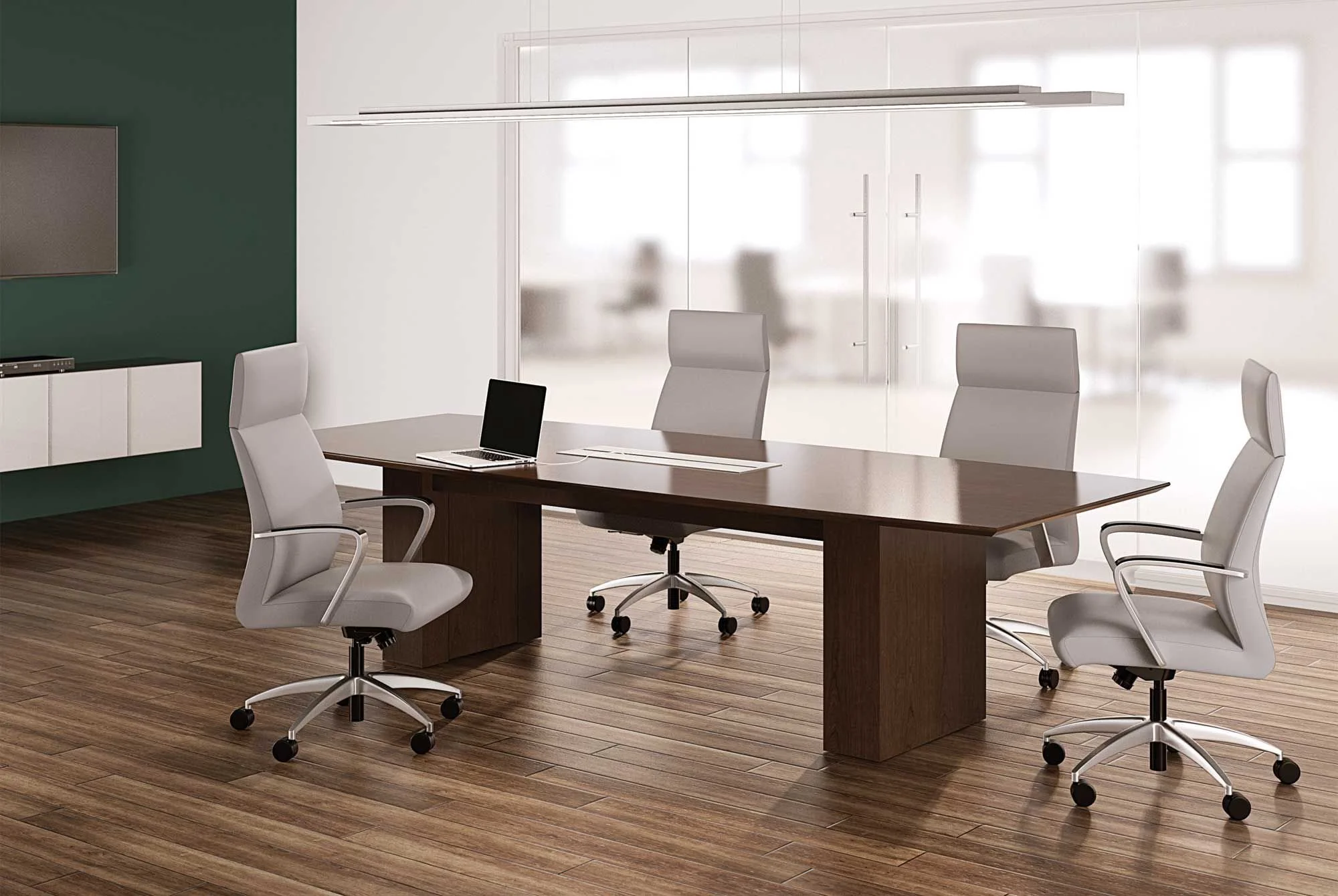 Modern conference room with a wood table, white chairs, a laptop, and a glass wall in the background.