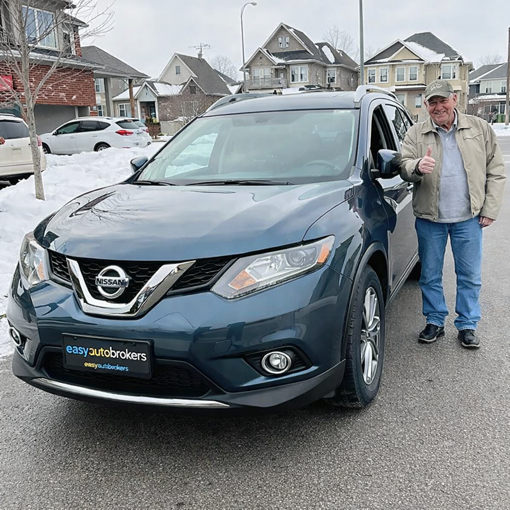 Man with Nissan Rogue in suburbia.png