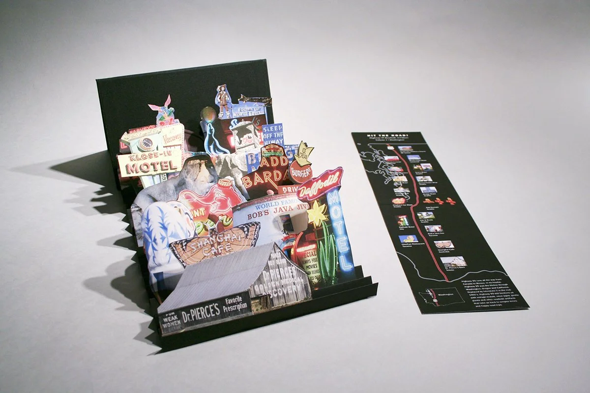 A pop-up book featuring Washington state neon signs.