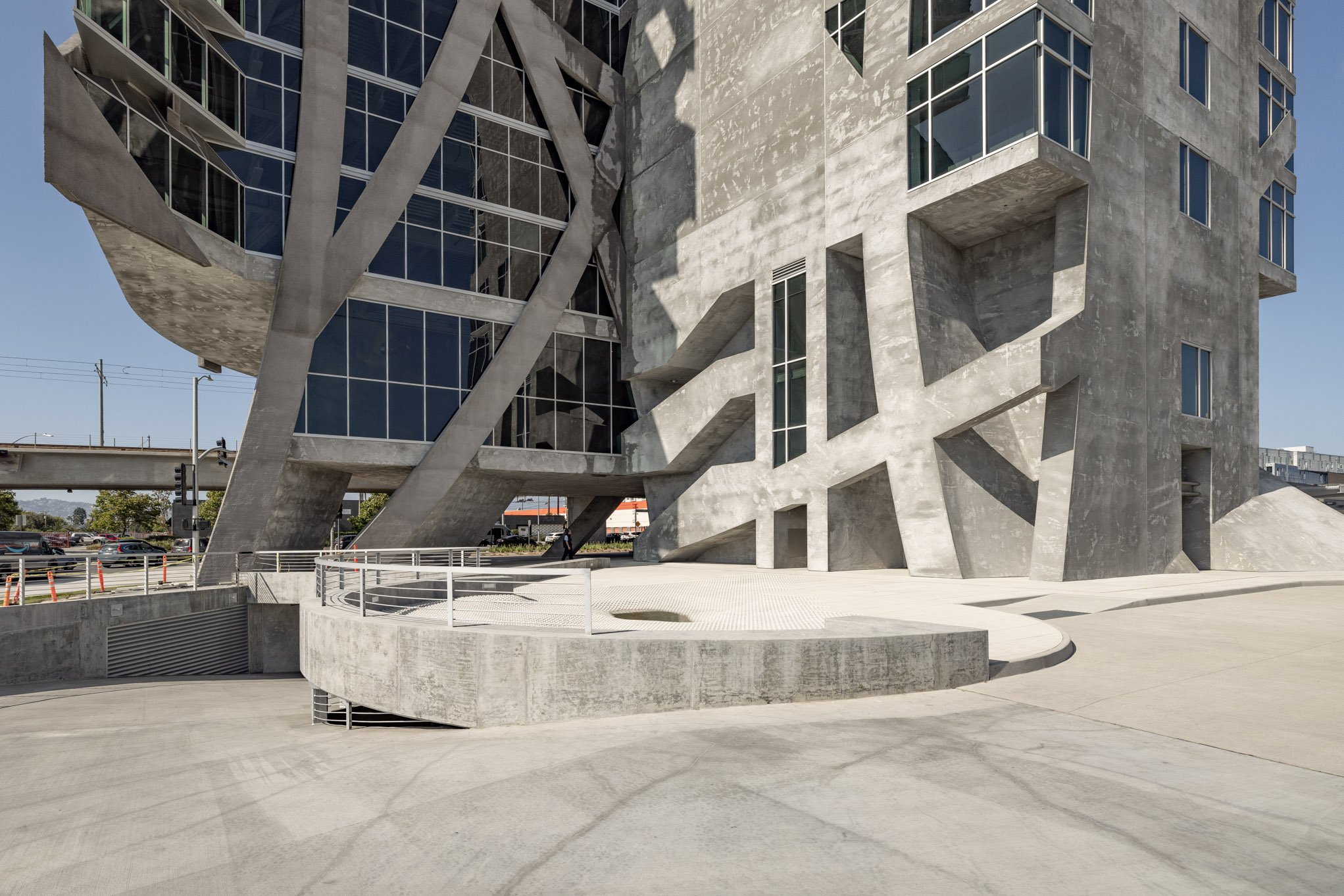 Modern concrete building with geometric design and large glass windows
