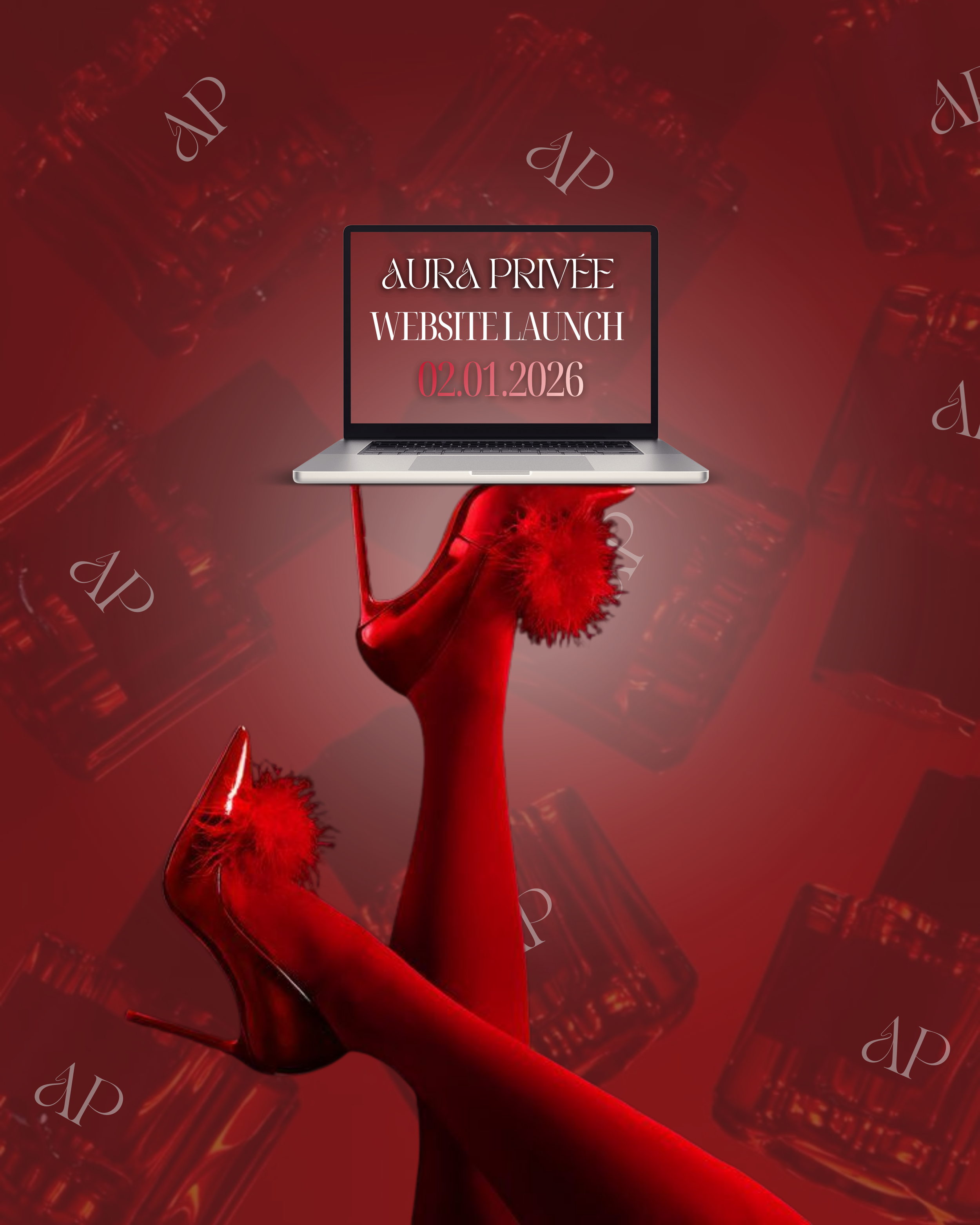 Red high heels with fluffy pom-poms on a pair of legs wearing red stockings, holding a laptop with the text 'Aura Privée Website Launch 02.01.2026' against a red background with perfume bottles.