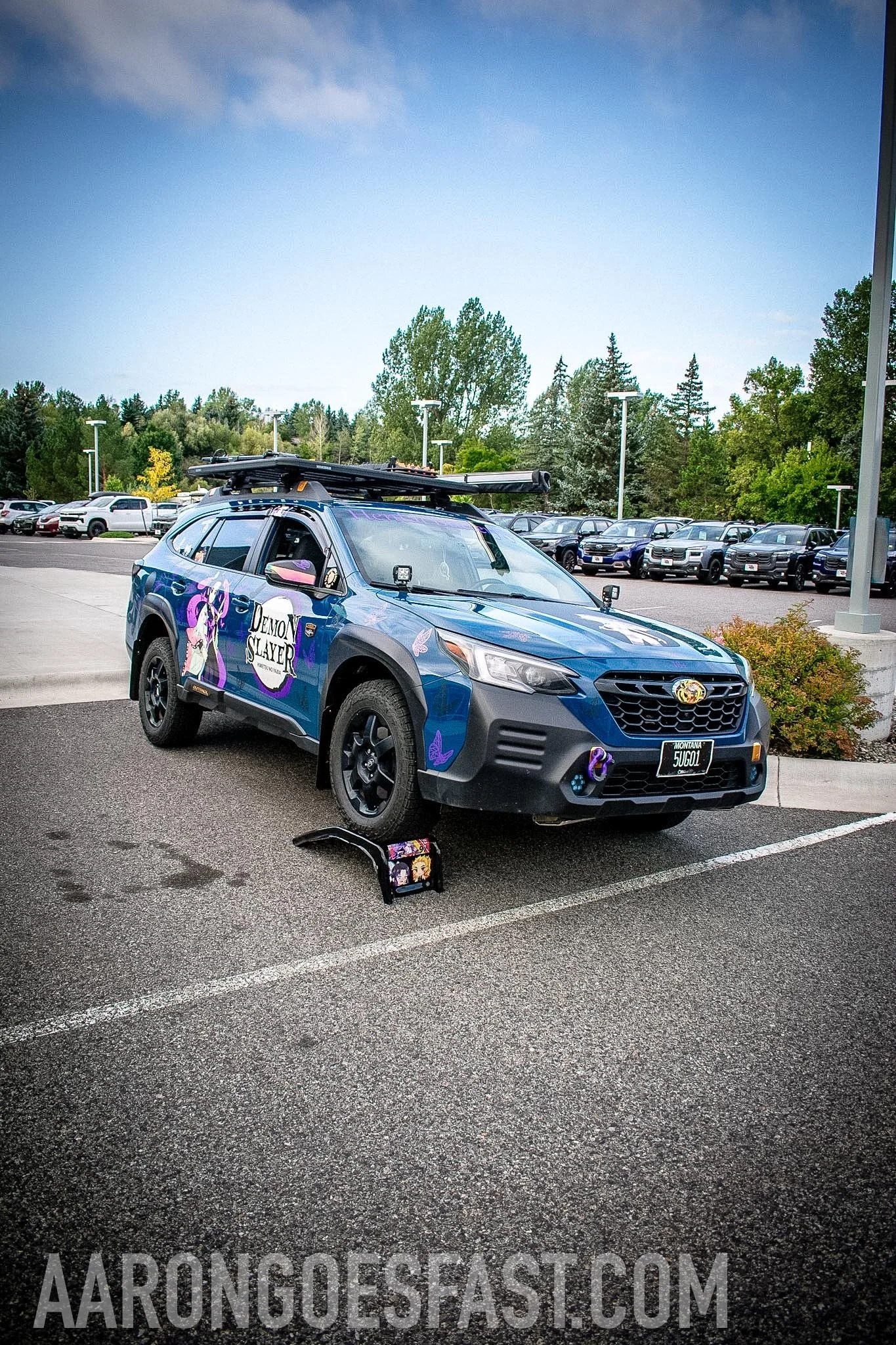 Blue Subaru with a roof rack at Ressler Cars & Coffee