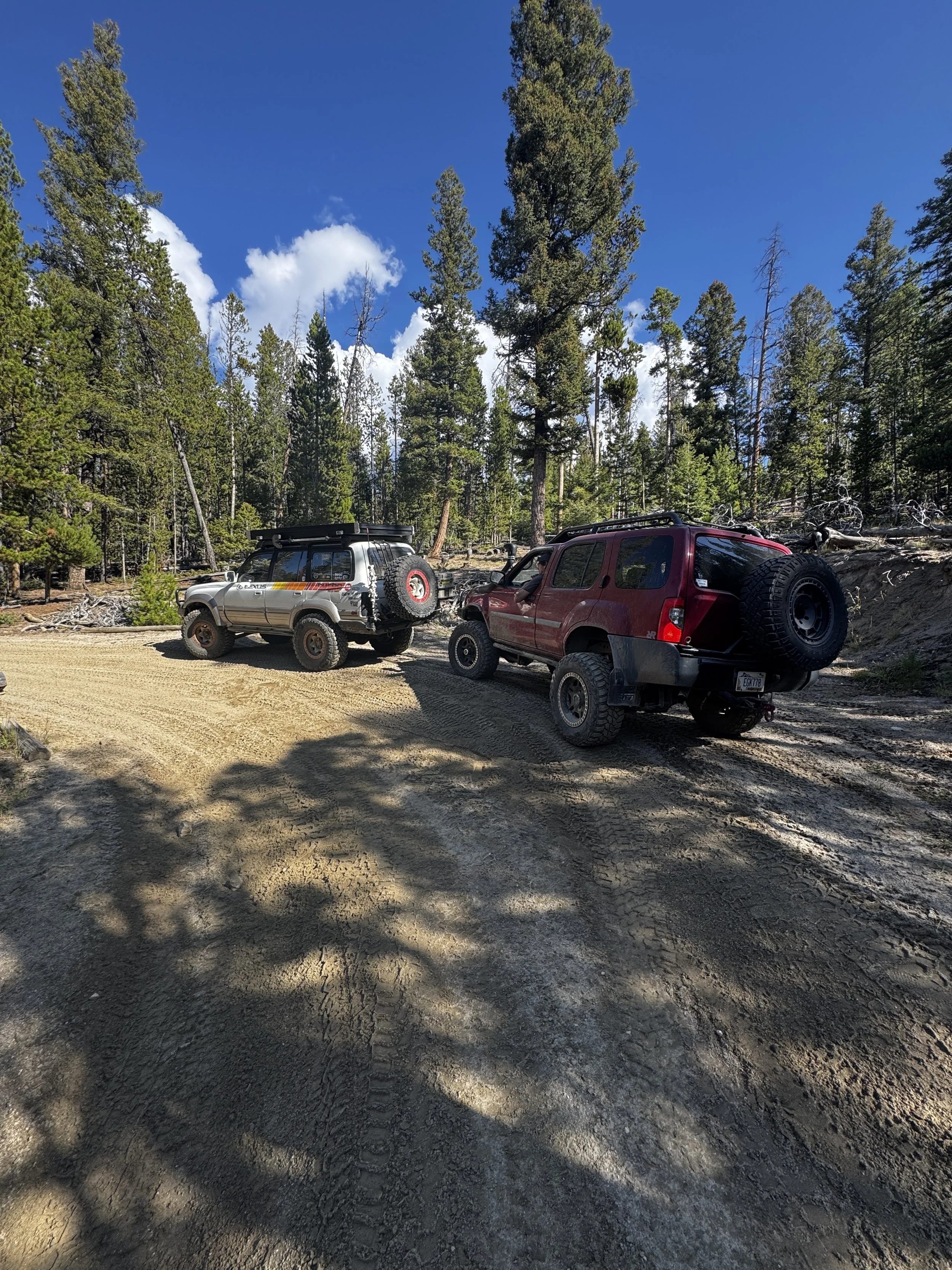 Rigs on a dirt road near Whitetail Reservoir