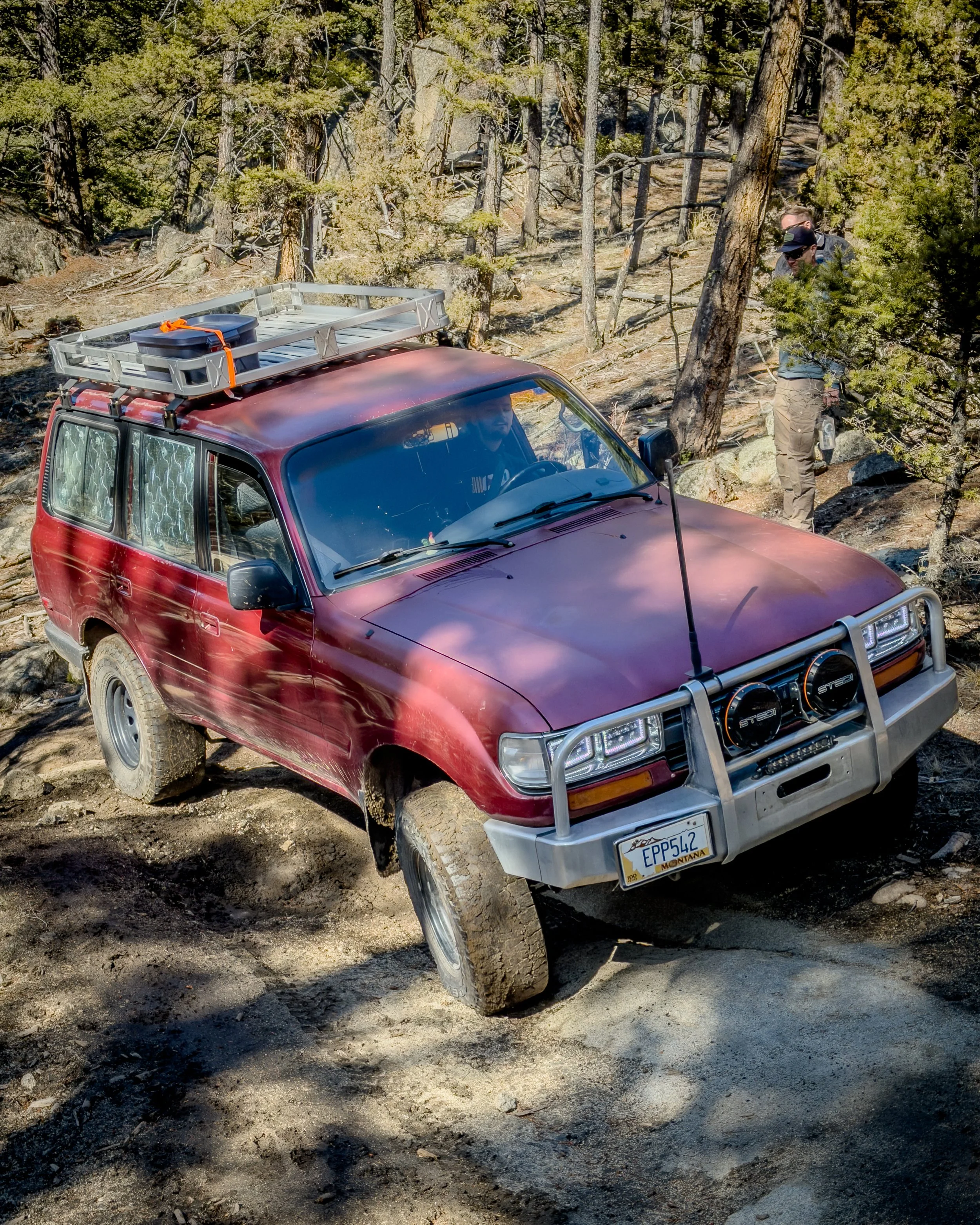 Red 4x4 on a winter Pipestone trail run