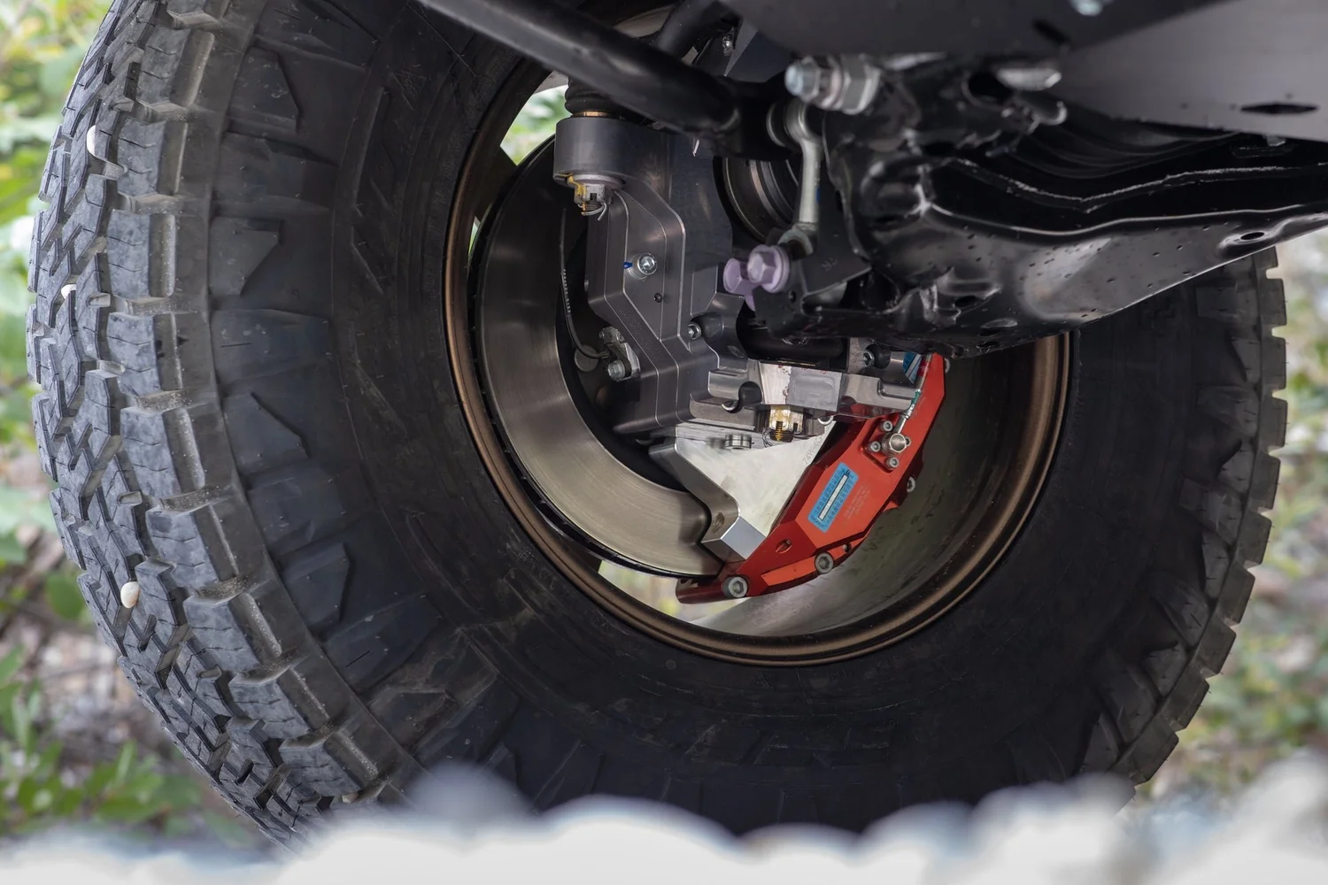 74 Weld portal axle hub and Power Brake caliper behind a Volk TE37 wheel on the Dissent LX 700h