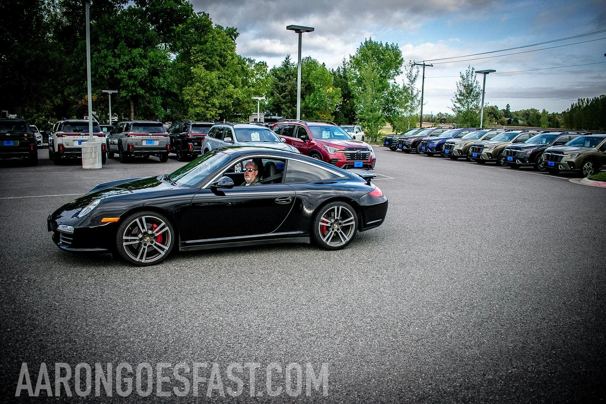 Black Porsche 911 in the lot at Ressler Cars & Coffee
