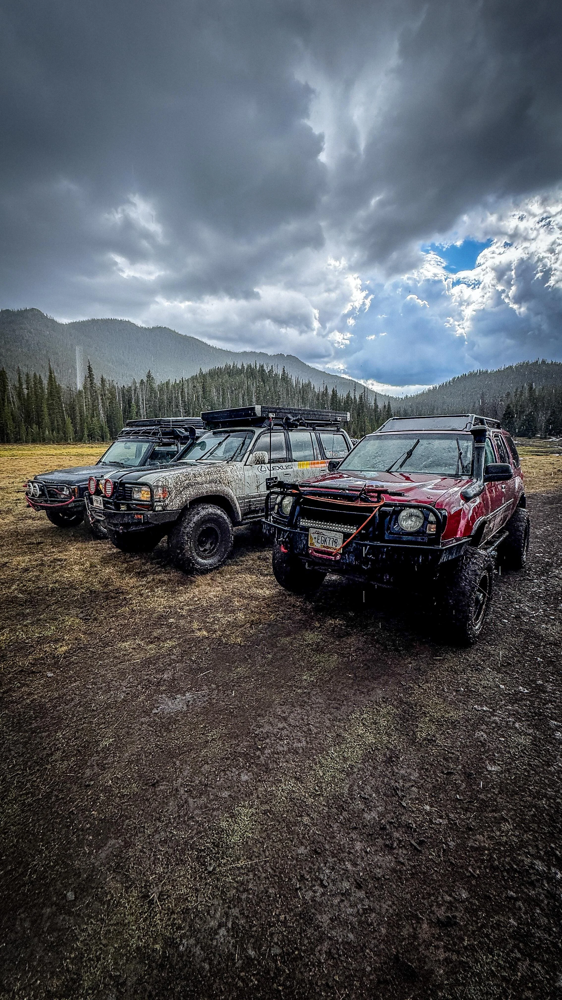 Rigs camped under storm clouds at Whitetail Reservoir