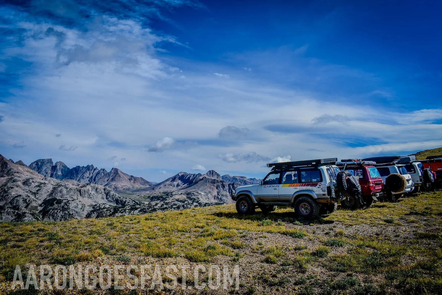 406 Cruisers convoy parked high in the Beartooth Mountains above Goose Lake