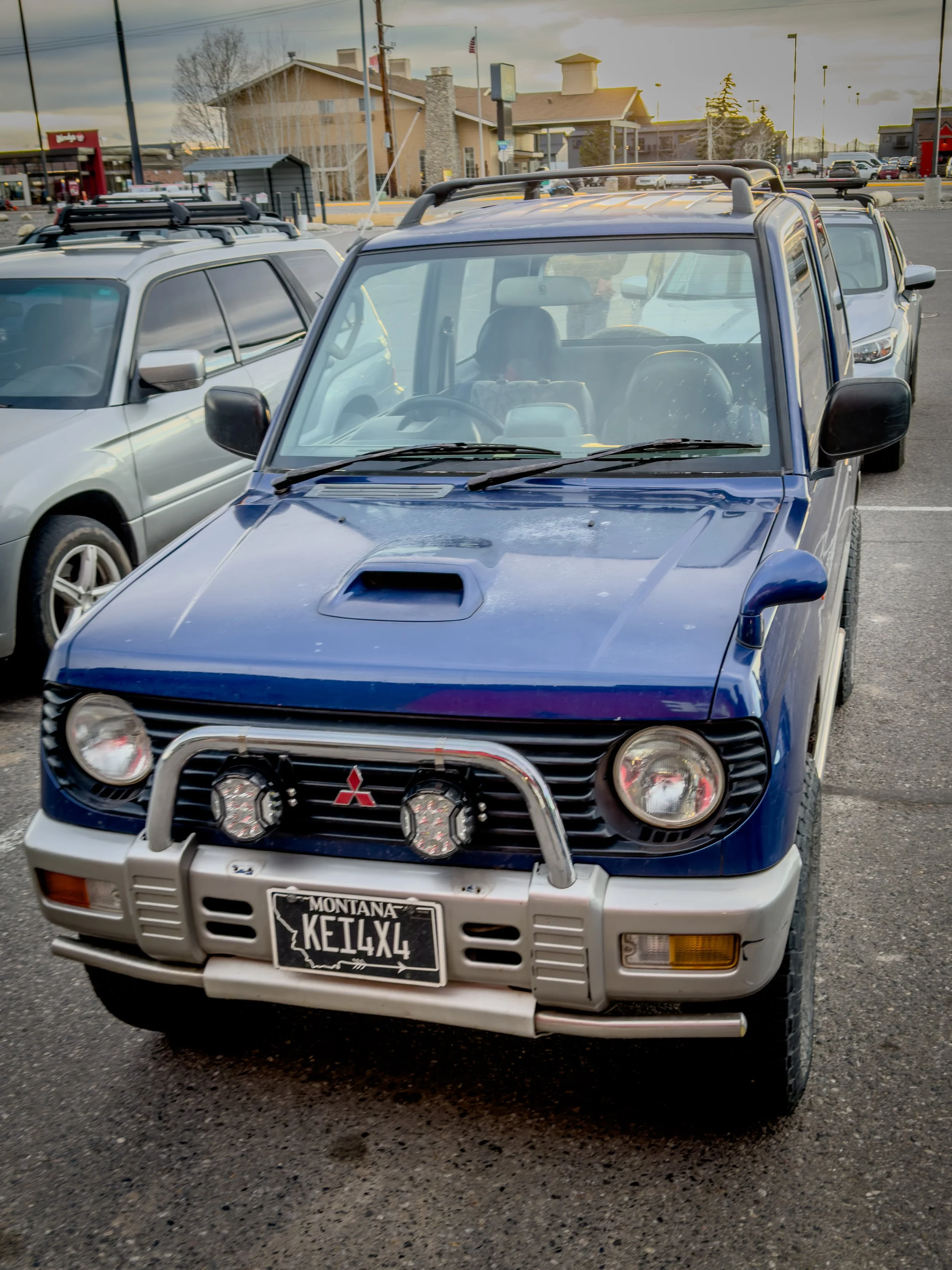 Blue Mitsubishi Pajero Mini kei SUV