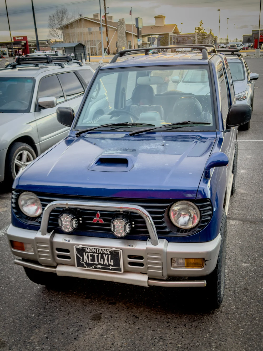 Blue Mitsubishi Pajero Mini kei SUV