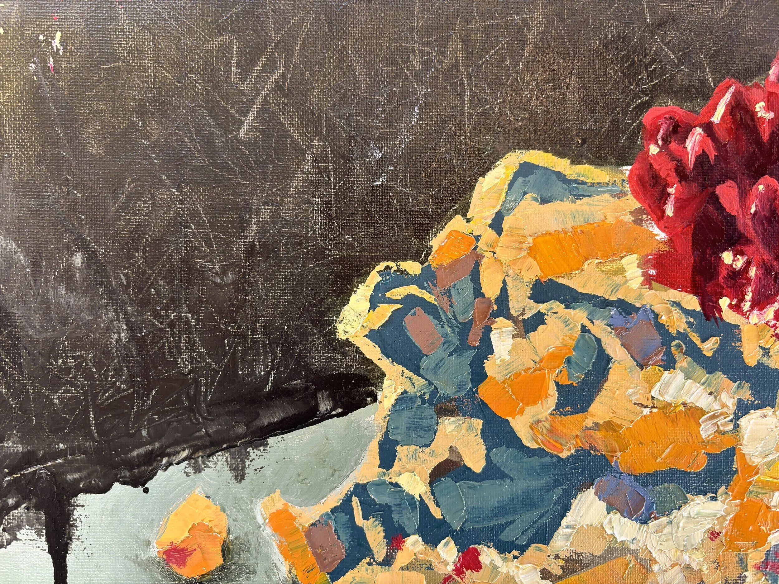 Close-up of an abstract oil painting of a cake with orange, blue, and beige geometric shapes and a red flowers on a dark textured background, by Anna Ford