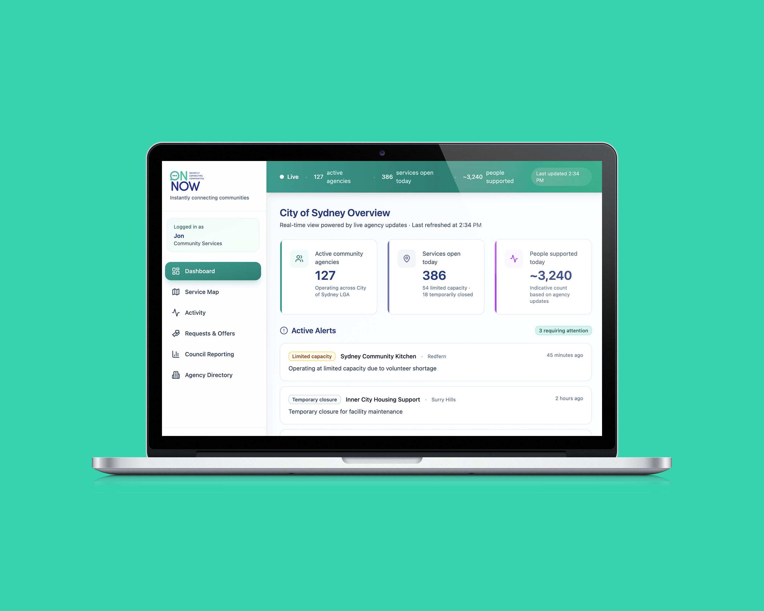 A laptop displaying a community services dashboard with city overview, active agencies, services open, people supported, and active alerts, set against a turquoise background.