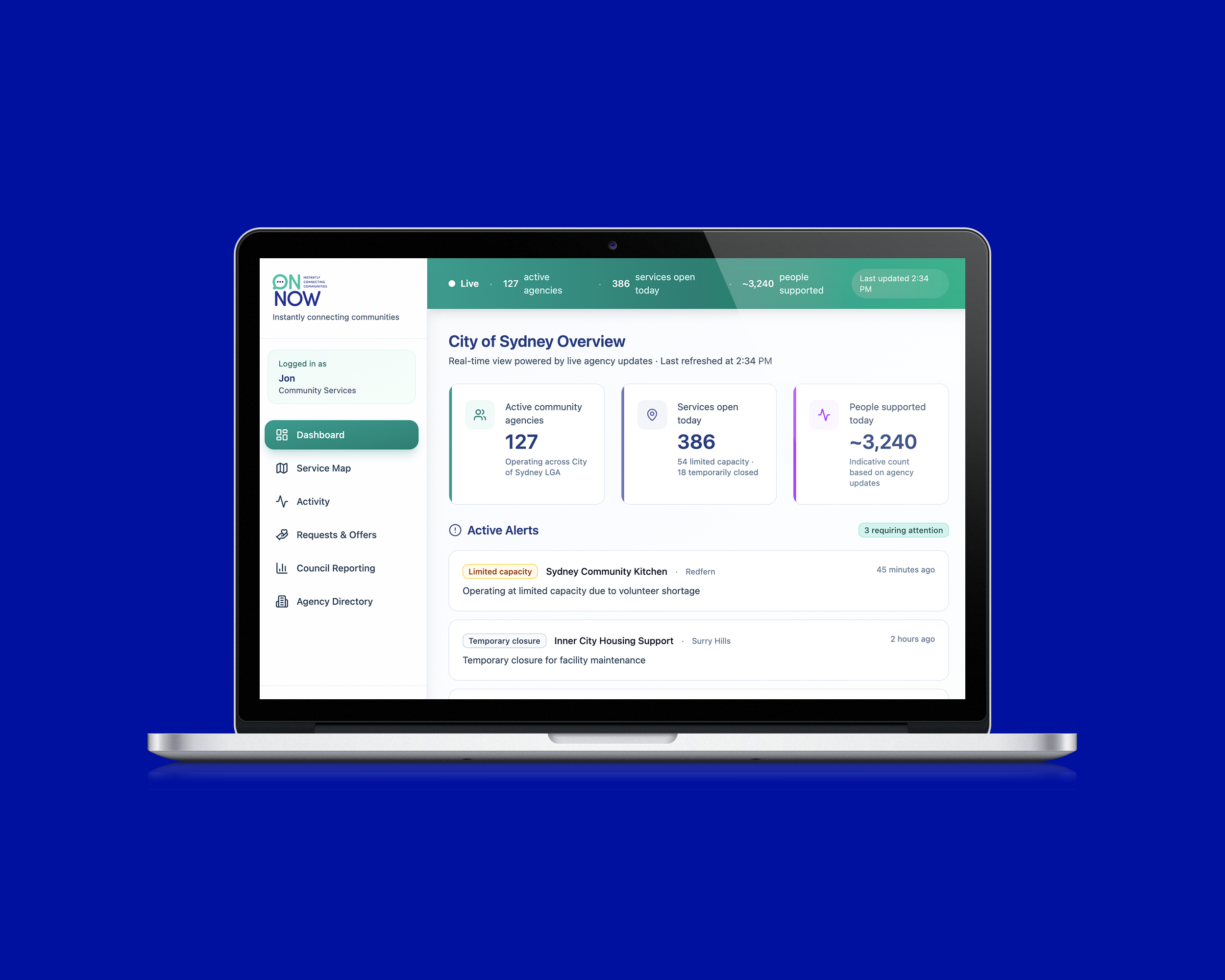 Laptop displaying a dashboard for city of Sydney community services with real-time updates on active agencies, services open, and supported people.