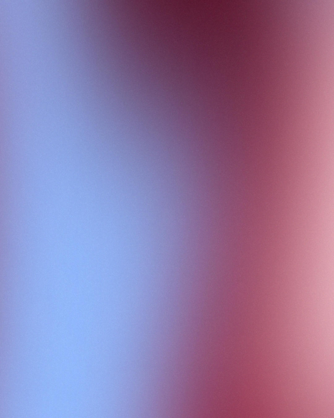 Image floue avec un dégradé de couleurs bleu, violet et rose.