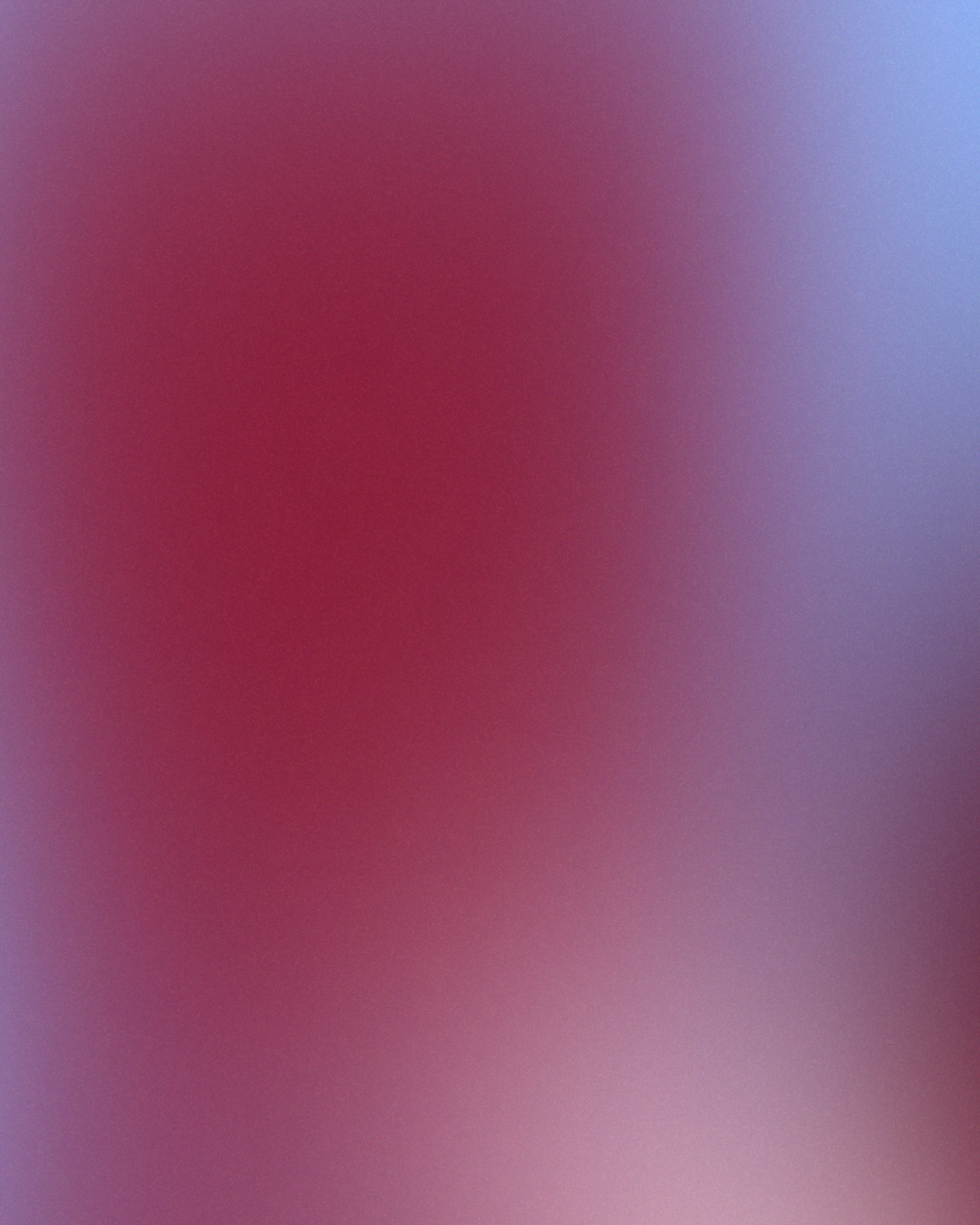 Image floue avec des nuances de violet, rose et bleu.