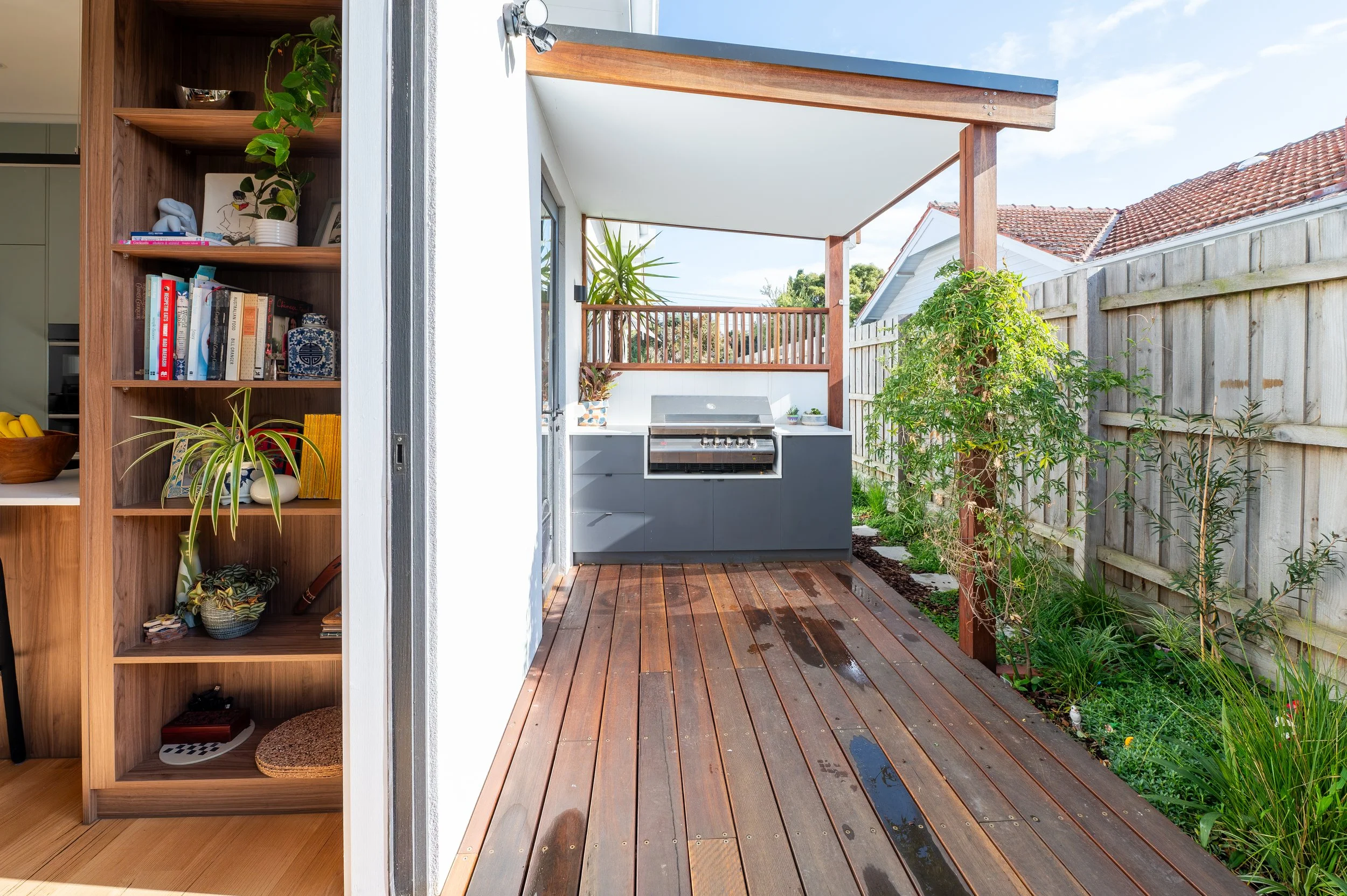 Outdoor BBQ at Oak Street Project connecting the kitchen to the deck.