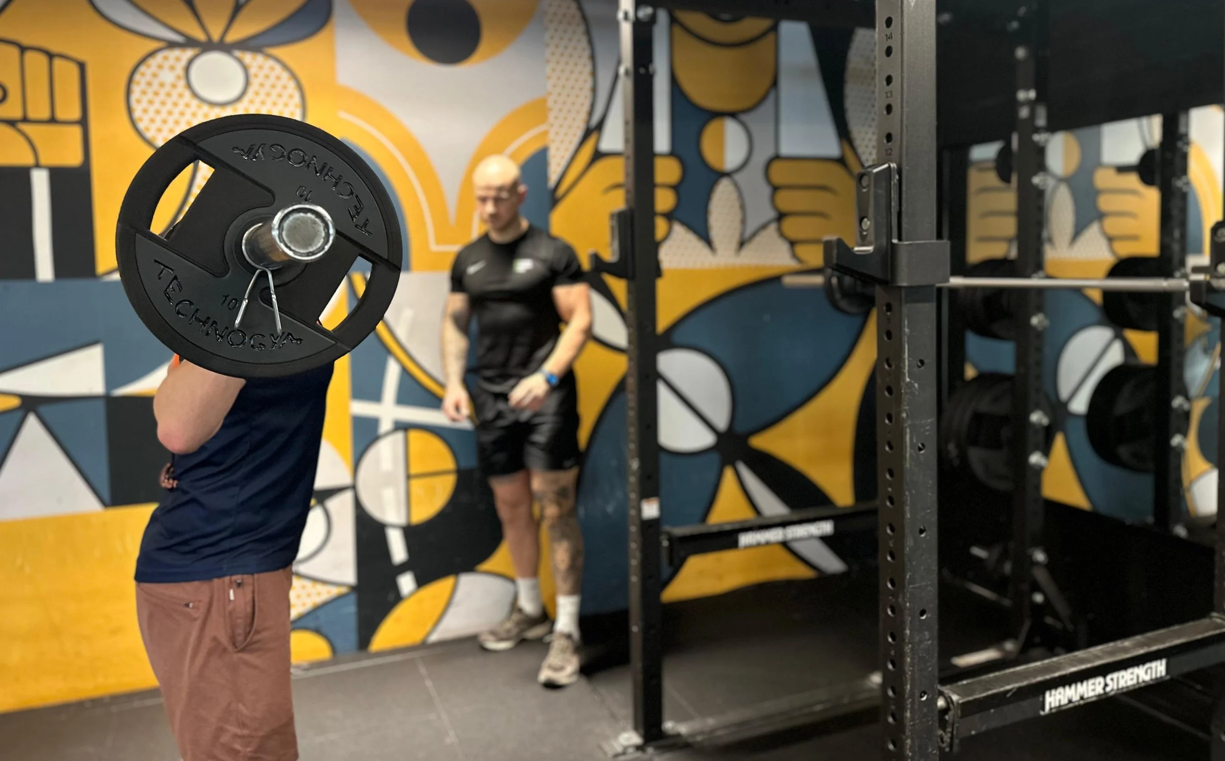 krachttraining met barbell tijdens personal coaching sessie