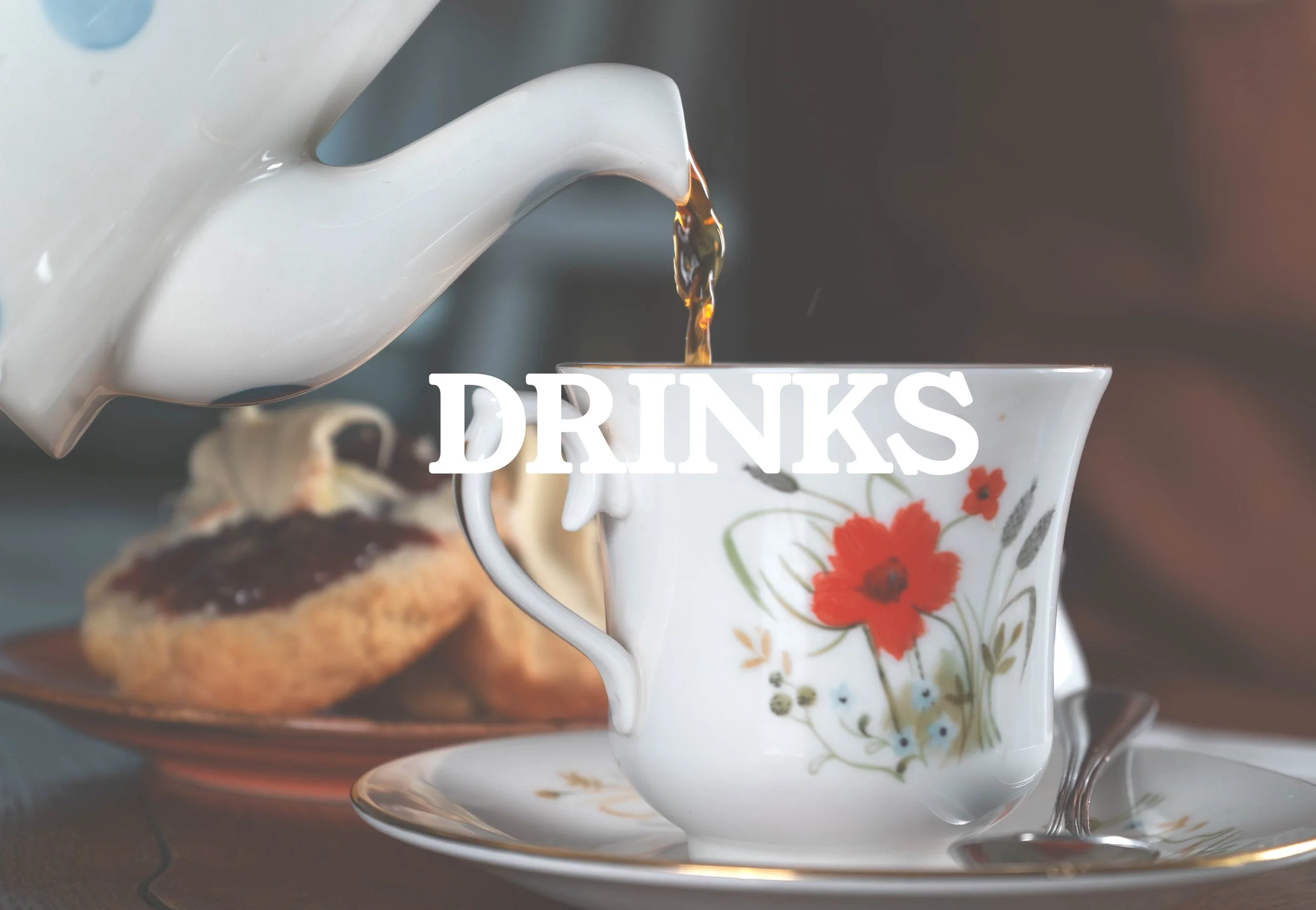 A close-up of a tea cup with red and green floral design, a teapot pouring tea into the cup, with a plate of cookies in the background, overlaid with the word 'DRINKS'.