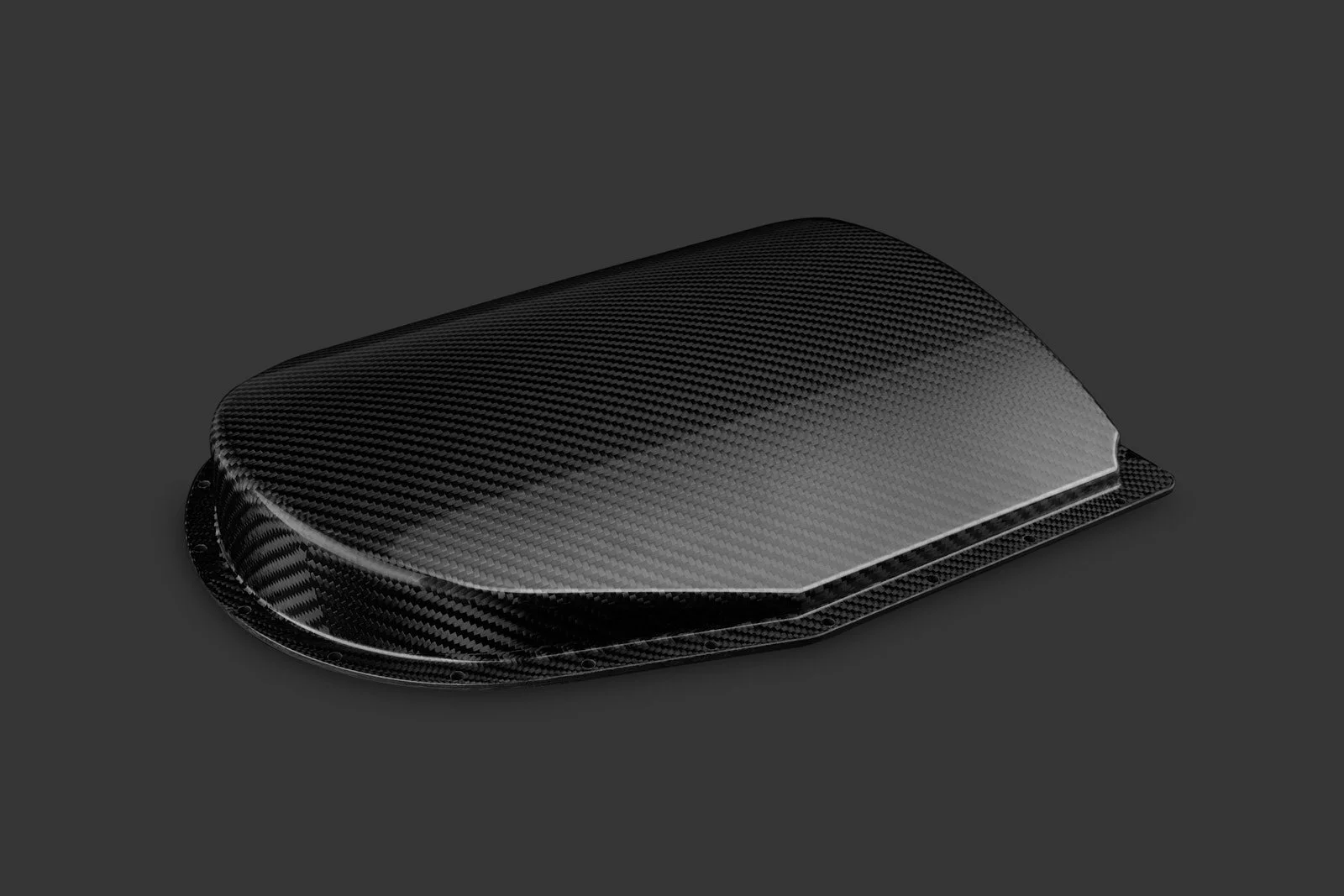A sleek, black carbon fiber car part or component with a curved, aerodynamic shape, set against a dark background.