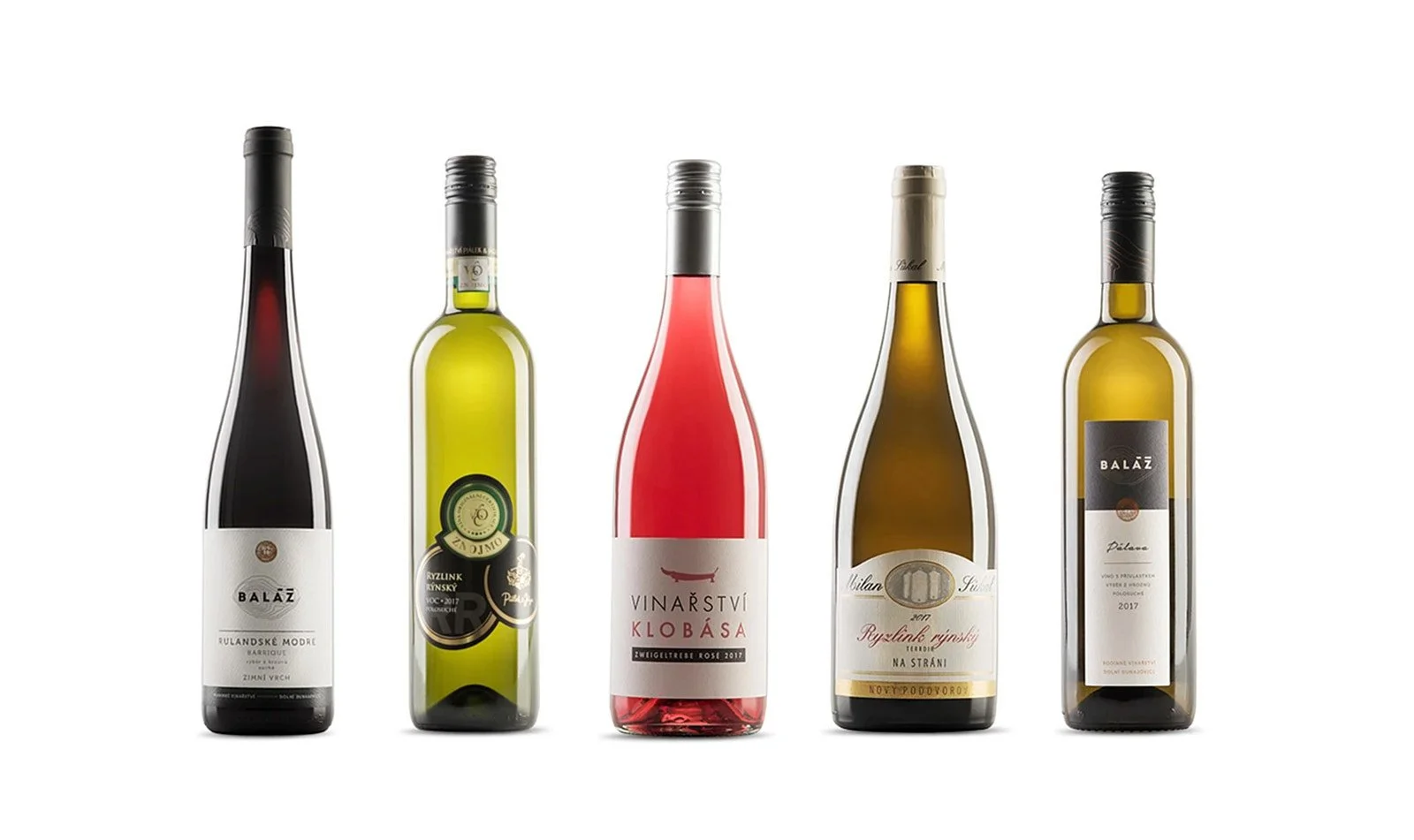 Five bottles of wine arranged in a row, each with different labels and colors.