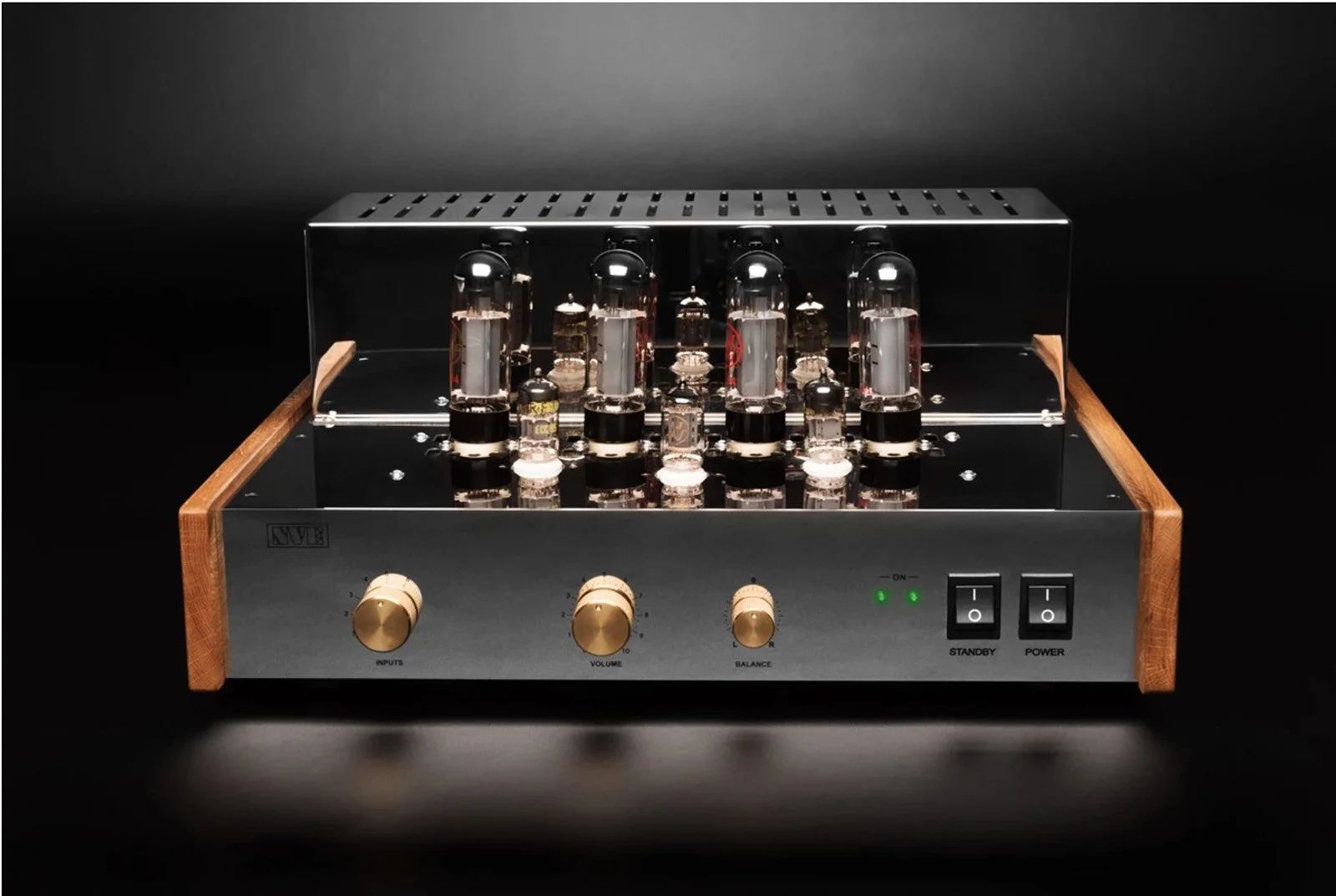 A vintage vacuum tube amplifier with a silver front panel, wooden side panels, and vacuum tubes arranged on top, set against a black background.