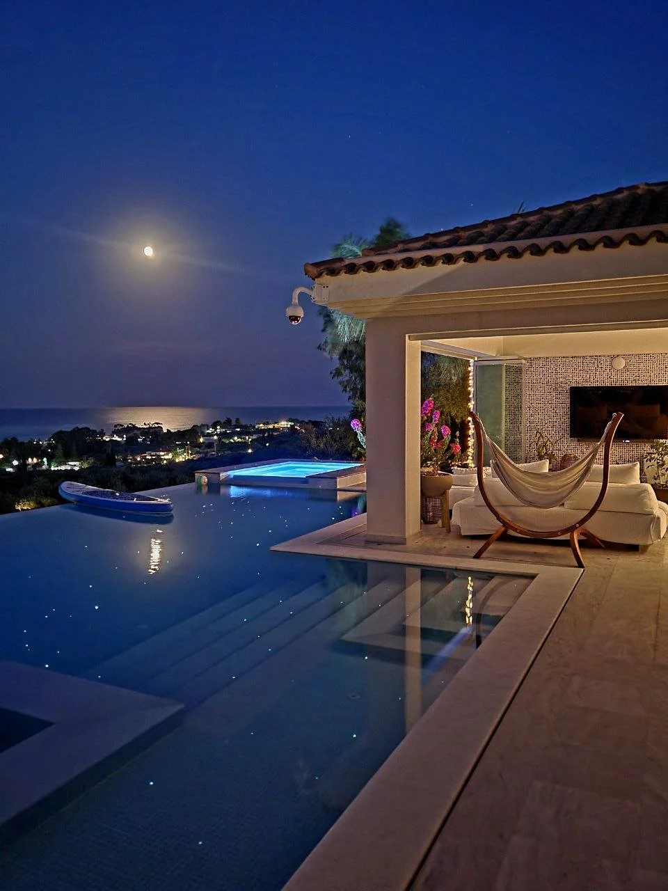 Villa Polyxeni private swimming pool at night with sea view in Zakynthos